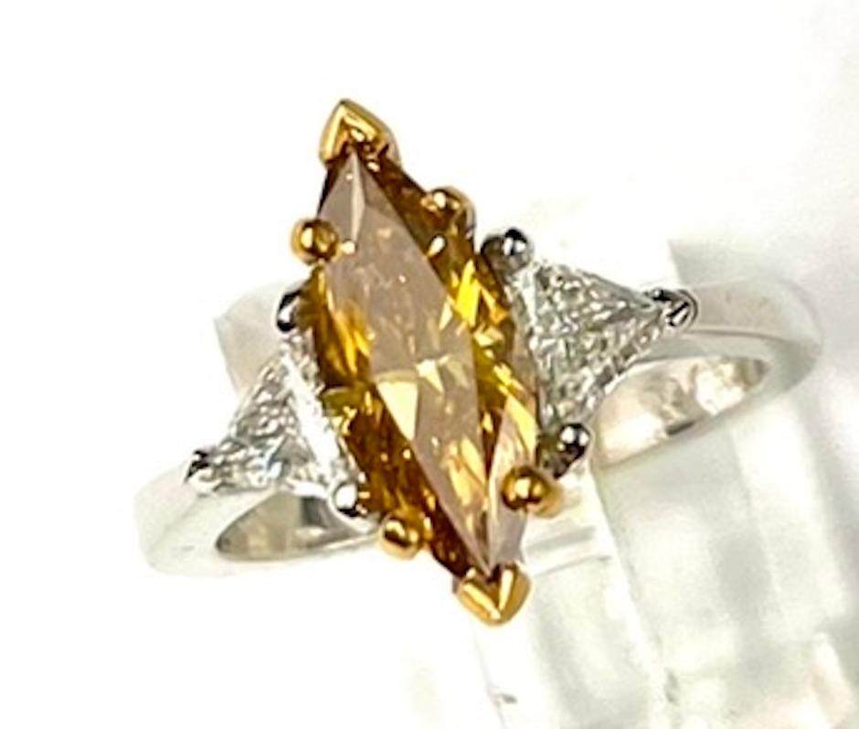 Contemporary 1.29Ct Marquise Diamond GIA Certified Fancy Deep Brownish Orangy Yellow Ring For Sale