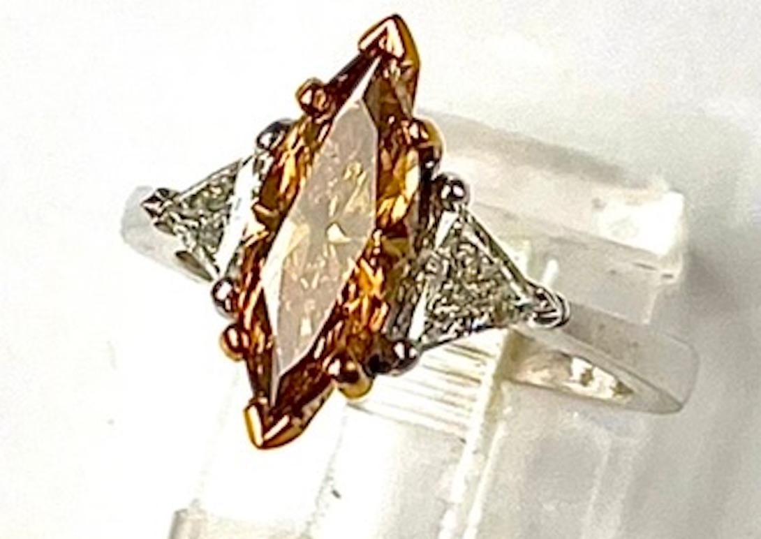 Women's or Men's 1.29Ct Marquise Diamond GIA Certified Fancy Deep Brownish Orangy Yellow Ring For Sale