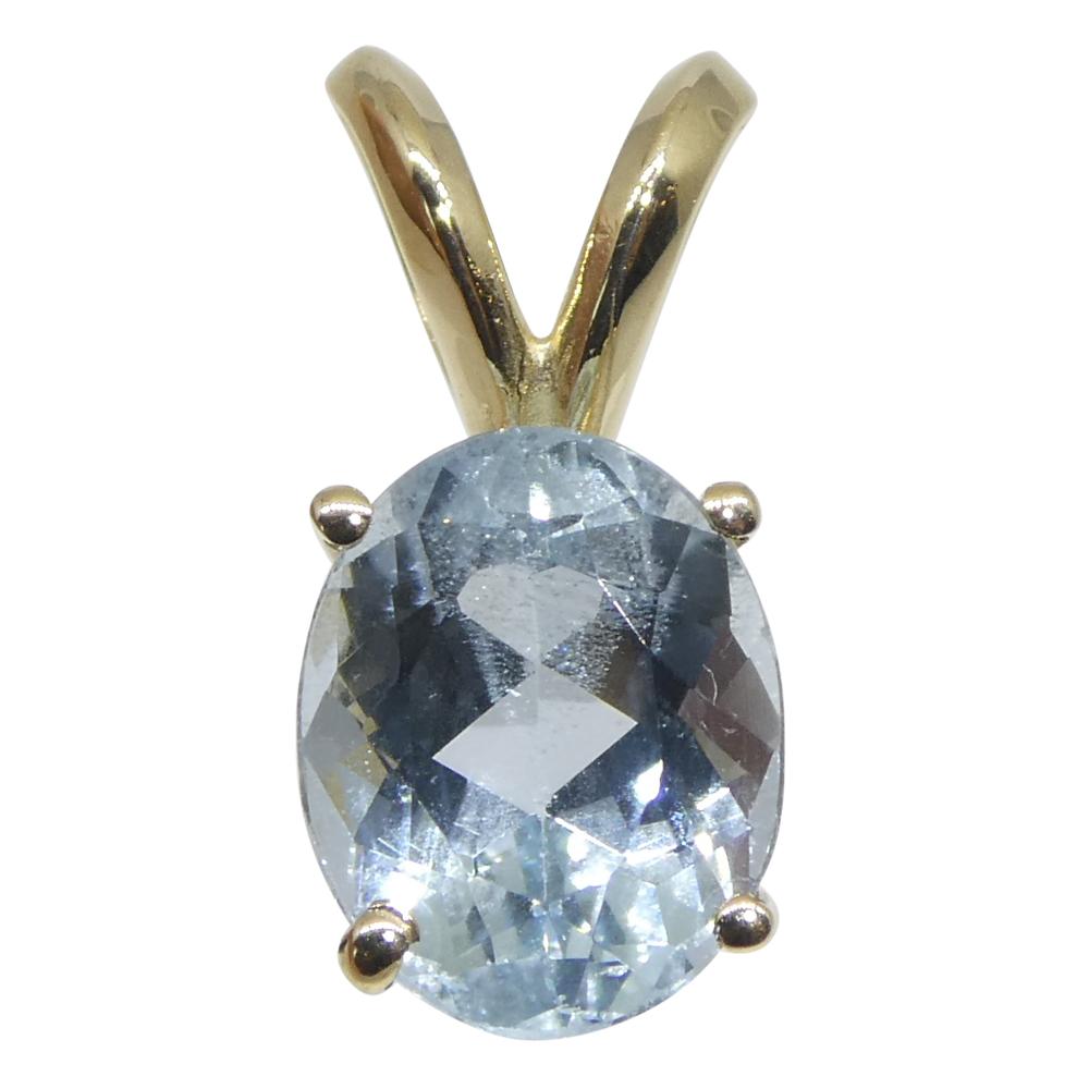 Contemporary 1.29ct Oval Blue Aquamarine Pendant set in 14k Yellow Gold For Sale