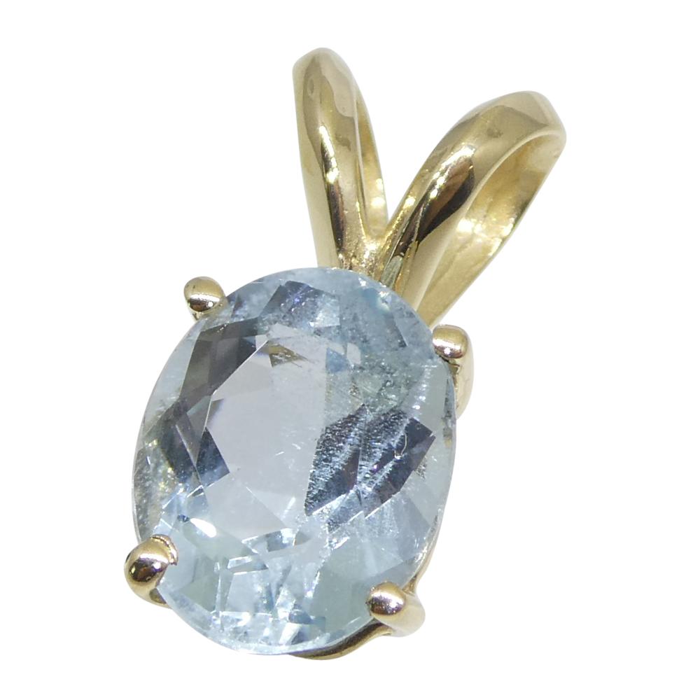 1.29ct Oval Blue Aquamarine Pendant set in 14k Yellow Gold In New Condition For Sale In Toronto, Ontario