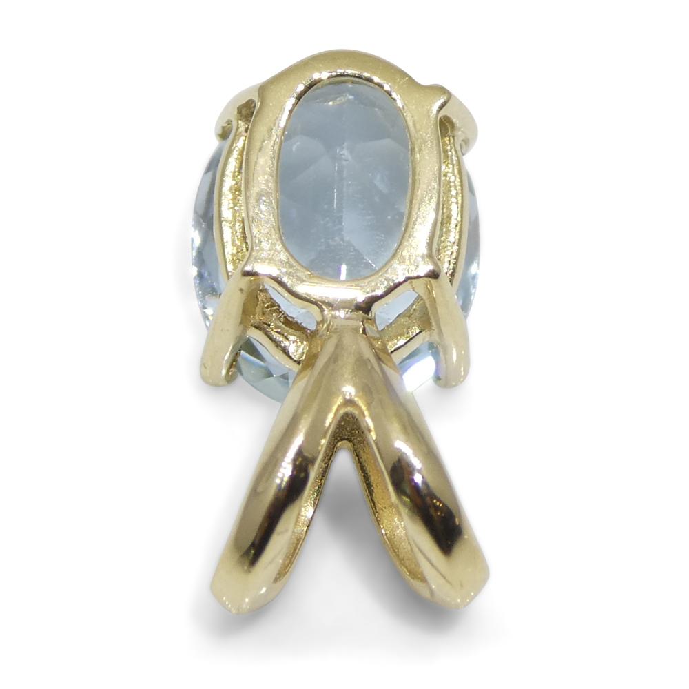 Women's or Men's 1.29ct Oval Blue Aquamarine Pendant set in 14k Yellow Gold For Sale