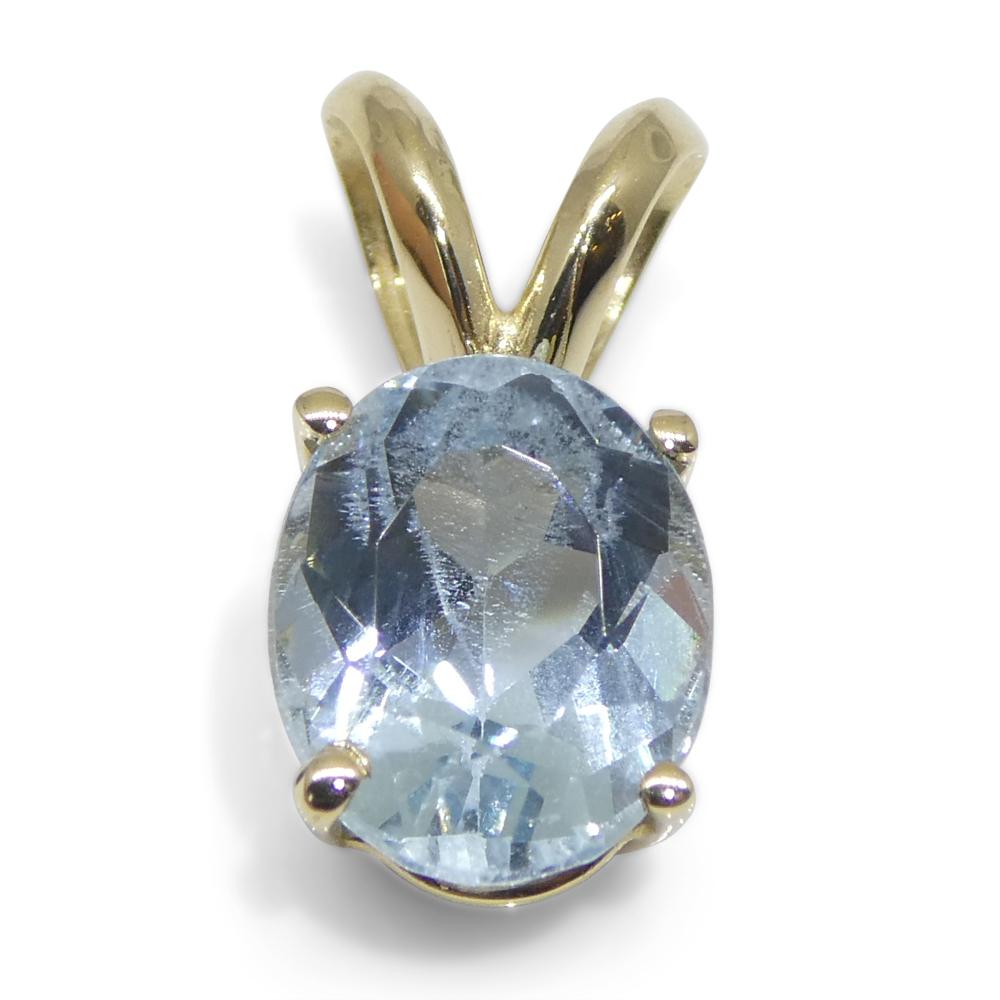 1.29ct Oval Blue Aquamarine Pendant set in 14k Yellow Gold For Sale 2