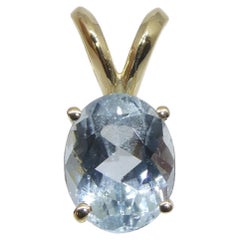1.29ct Oval Blue Aquamarine Pendant set in 14k Yellow Gold