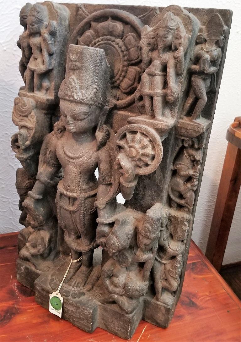 PRESENTING a STUNNING piece of Indian Antiquity from the 12th Century, namely, a Vishnu Dark Grey Sandstone Carving.

From Central India.

This piece has impeccable Provenance !

It was purchased by a Private Dallas Collector at Sotheby’s New York