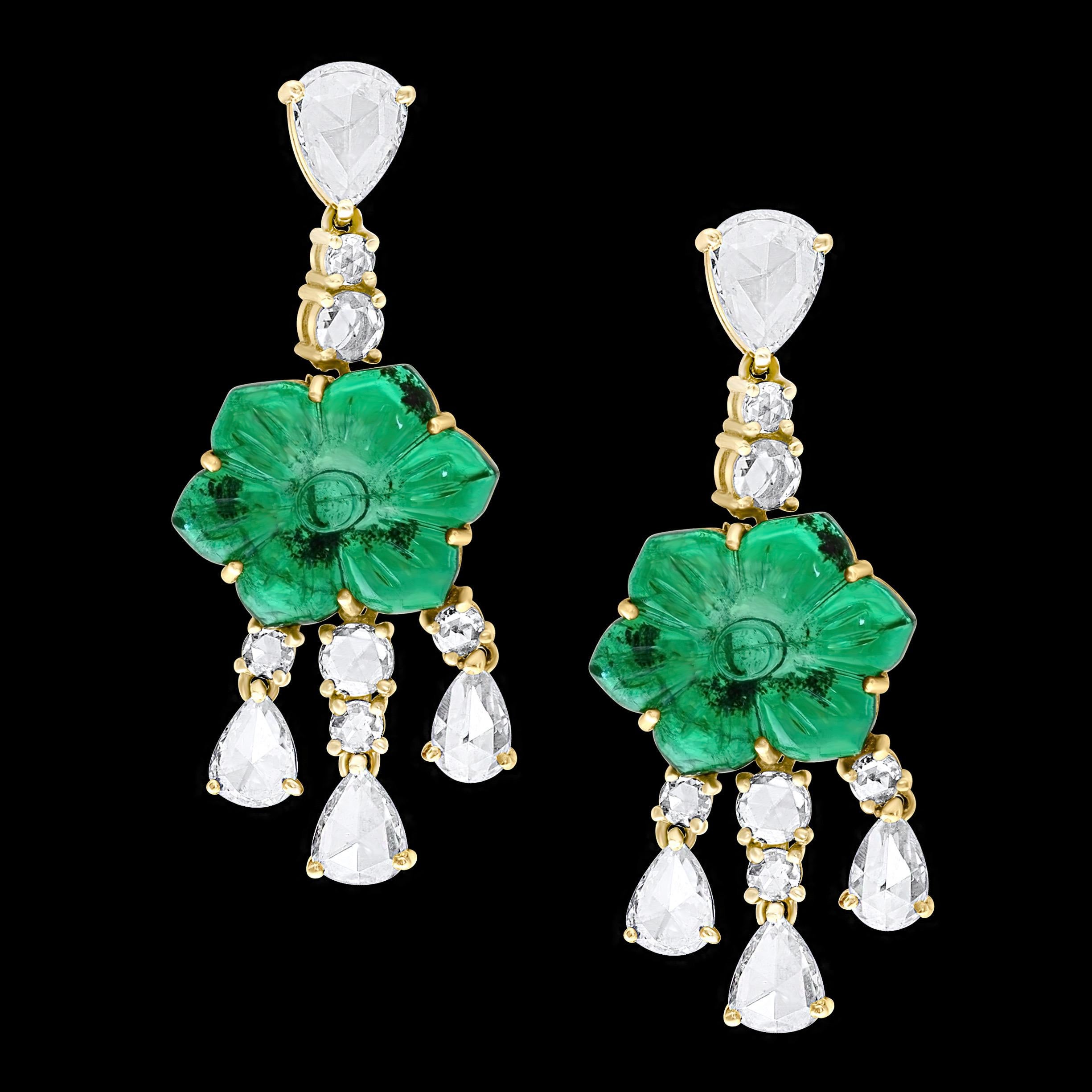 12Ct Carved Emerald & 5 Ct Rose Diamond Dangling Post Earrings 22 Kt Yellow Gold
Discover elegance in our Emerald Diamond Post Earrings crafted with 22 Karat Yellow Gold. The earrings feature two finely carved flower emeralds with an approximate
