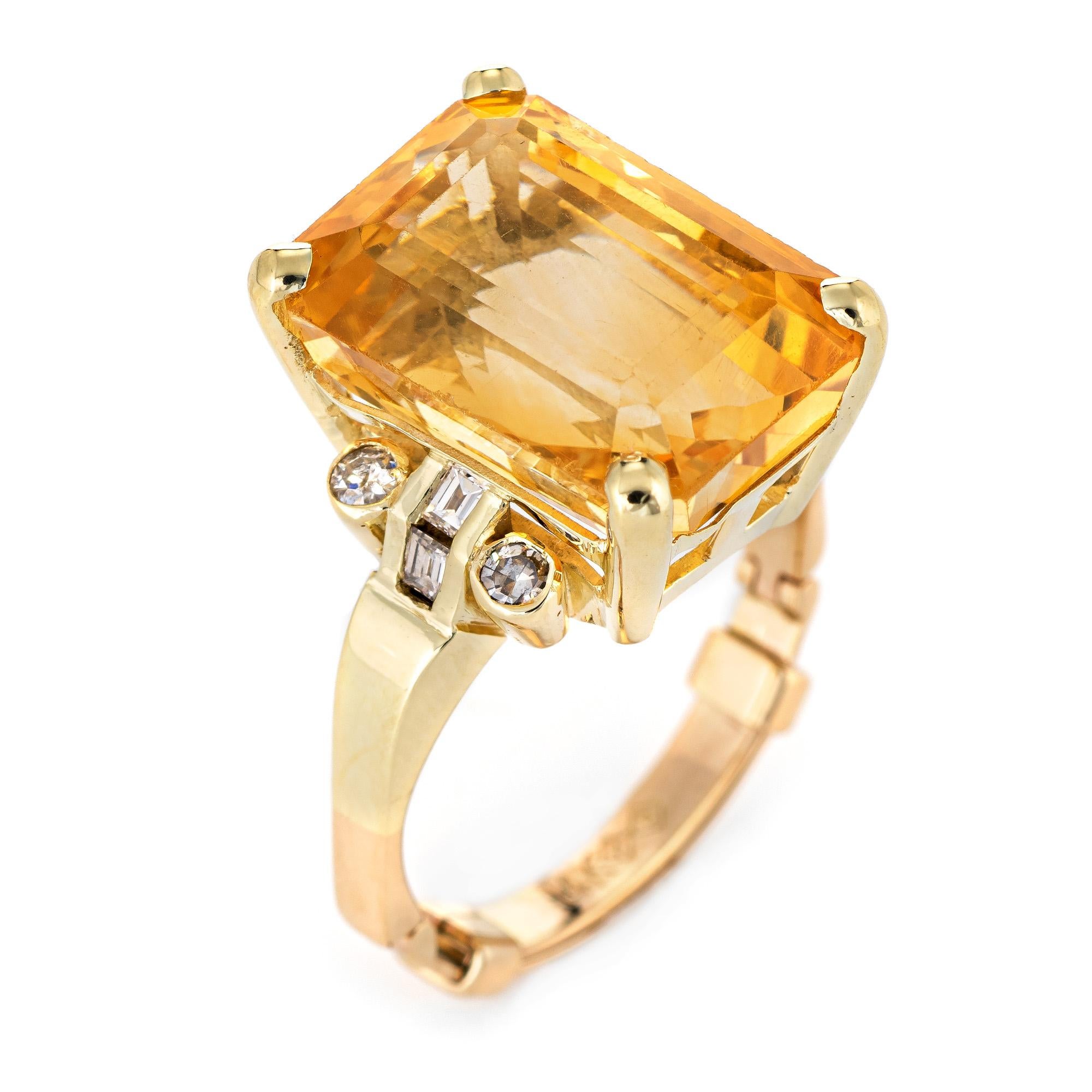 Stylish vintage citrine & diamond cocktail ring (circa 1960s to 1970s) crafted in 14 karat yellow gold. 

The golden hued citrine is securely set in a four pronged mount. The statement ring adds a nice pop of color on the hand. The high rise ring