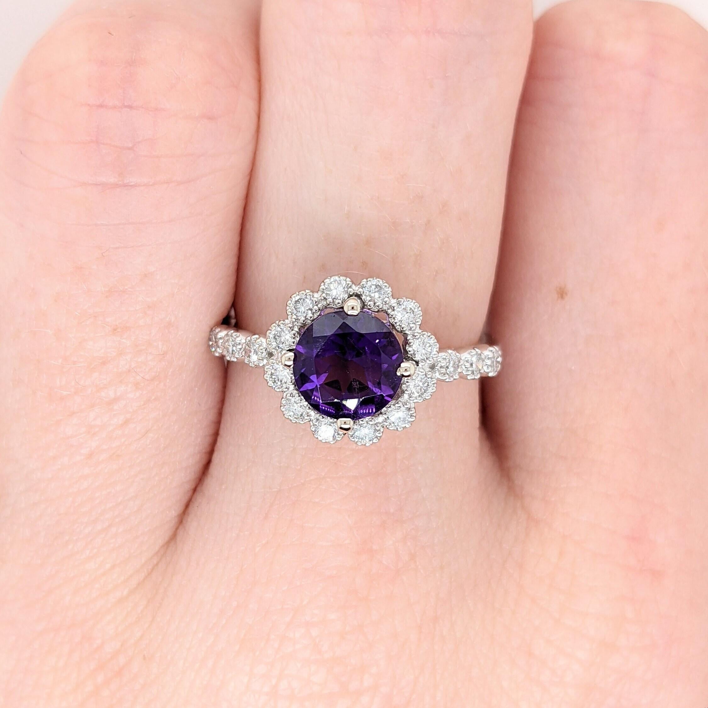 This elegant ring features a 1.23 carat deep purple amethyst with natural earth mined diamonds set in solid 14k gold. This ring makes for a stunning accessory to any look! This ring also makes a beautiful February birthstone gift for your loved