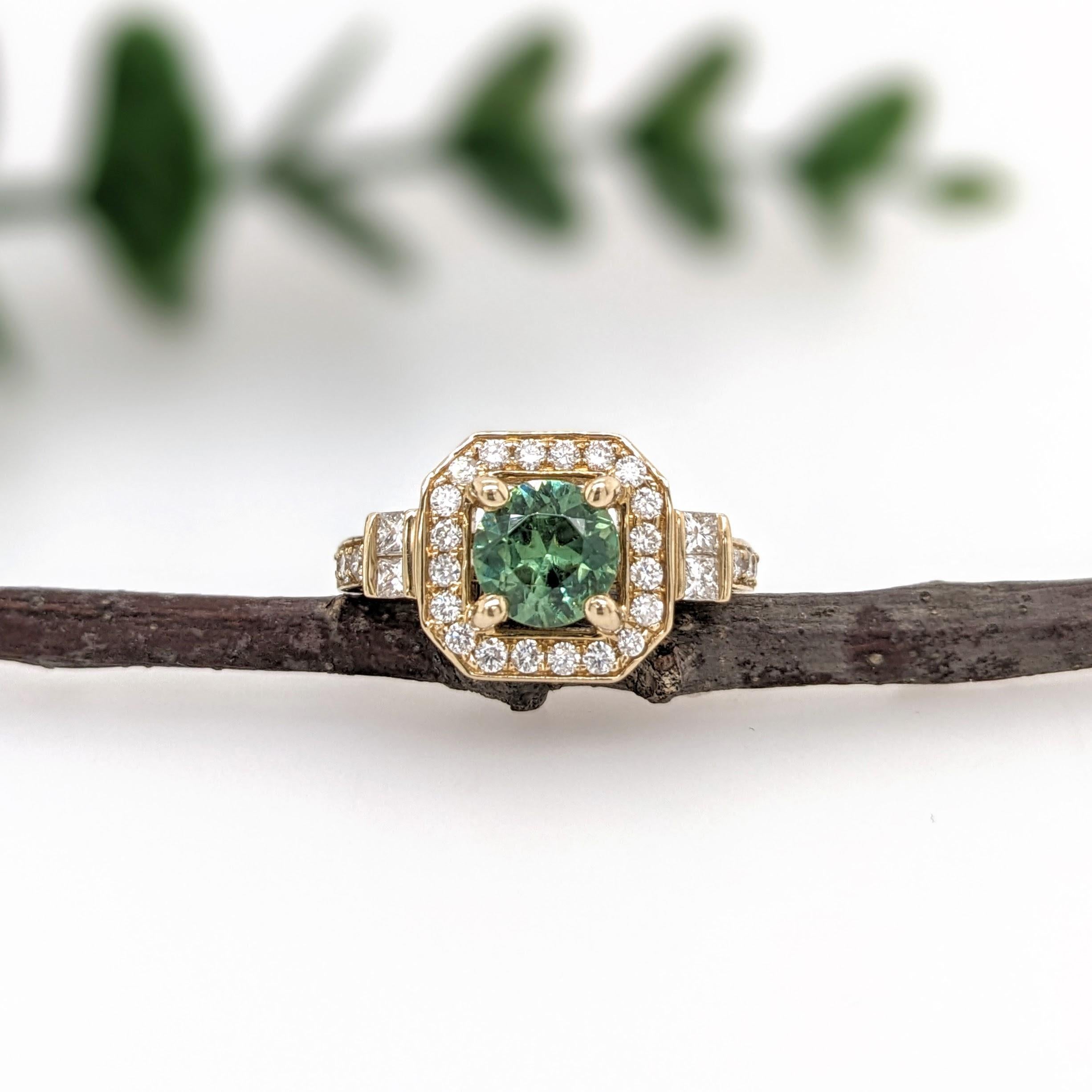 This beautiful estate ring features a 1.20 carat Demantoid with natural earth mined diamonds set in solid 14K gold!

Specifications

Item Type: Ring
Center Stone: Demantoid
Treatment: None
Weight: 1.20ct
Stone size: 6.3mm
Head