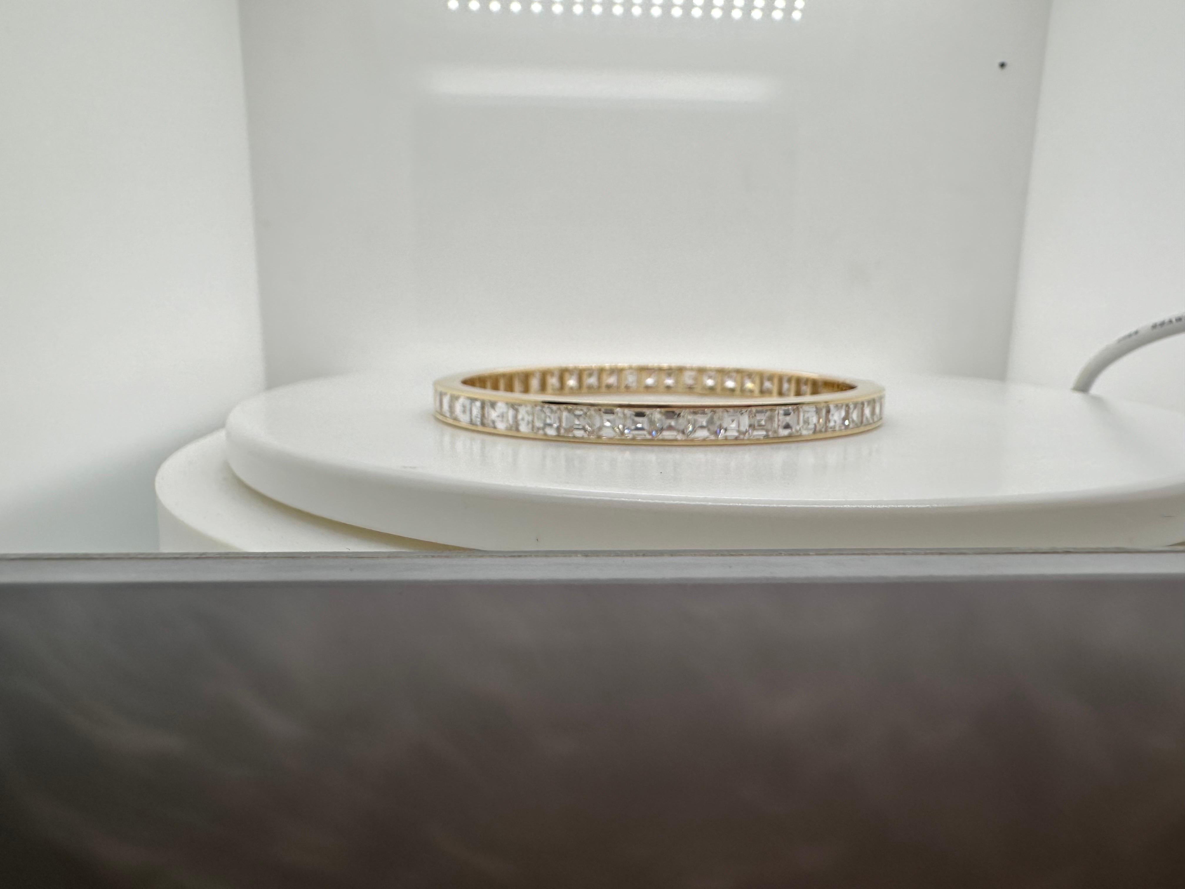 One of a kind bangle bracelet made to perfection with incredible craftsmanship and fine diamonds.

Metal Type: 18KT

Natural Diamond(s): 
Color: F-G
Cut:Square Brilliant
Carat: 12ct
Clarity: VS (average)

Certificate of authenticity comes with