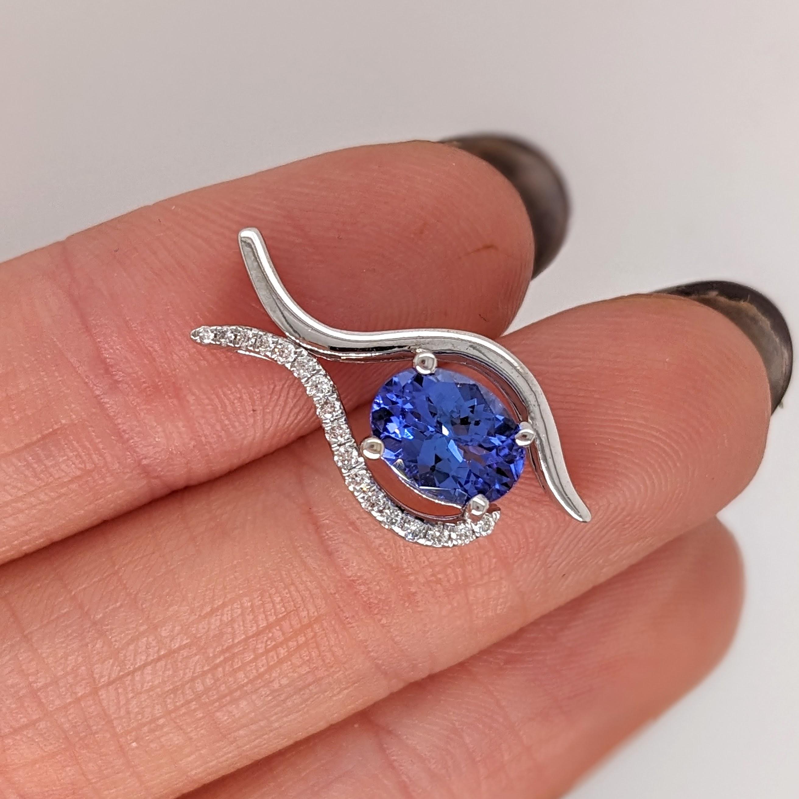 This unique pendant features a 1.26 carat oval tanzanite with natural earth mined diamonds, all set in solid 14K gold. This pendant can be a beautiful December birthstone gift for your loved ones! 

Specifications

Item Type: Pendant
Center
