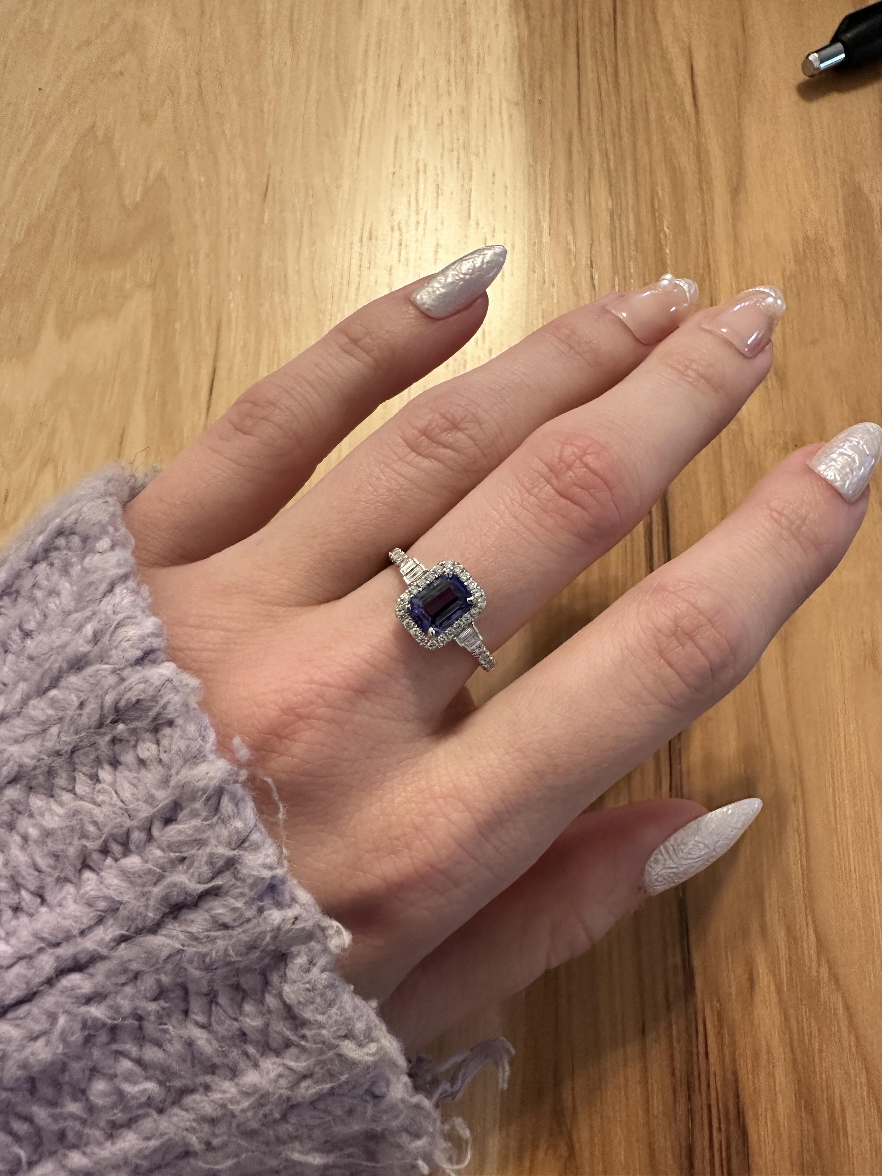 Effortlessly elegant, this 1.21ct Tanzanite Ring is a minimalist dream. Set in solid 14k White Gold and accented with Earth Mined Diamonds, it's the perfect piece for any occasion. With a stunning 7x5mm stone, this ring is sure to make a statement