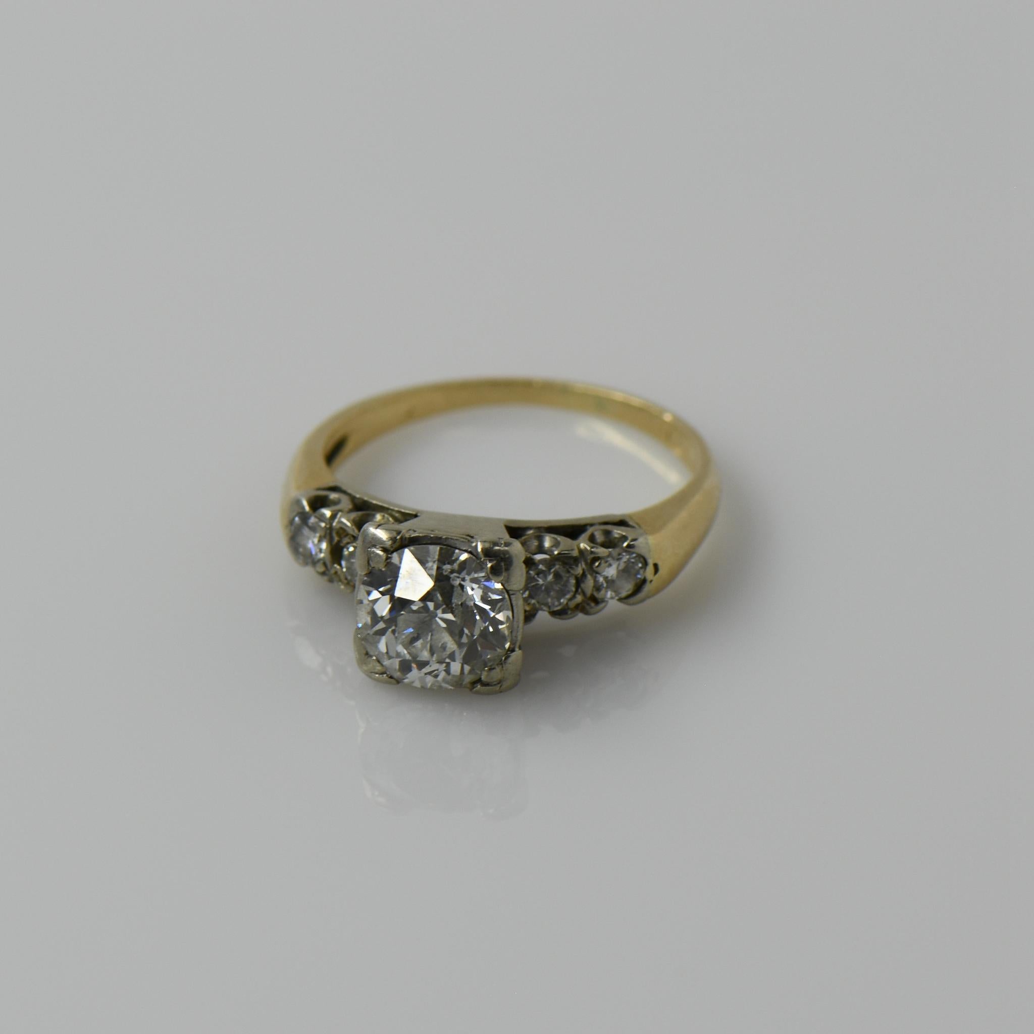 Size: 4.25
Metal Type: 14K White Gold / Yellow Gold 
Weight: 2.6G
Gold Melt Value: $122
Width: 6.89mm to 1.17mm at shank
Finger to Top of Ring: 7.49mm
Hallmarks: None

Primary Gem Details: 
Type: Diamond
Quantity: 1
Cut: Old European Cut
Carat