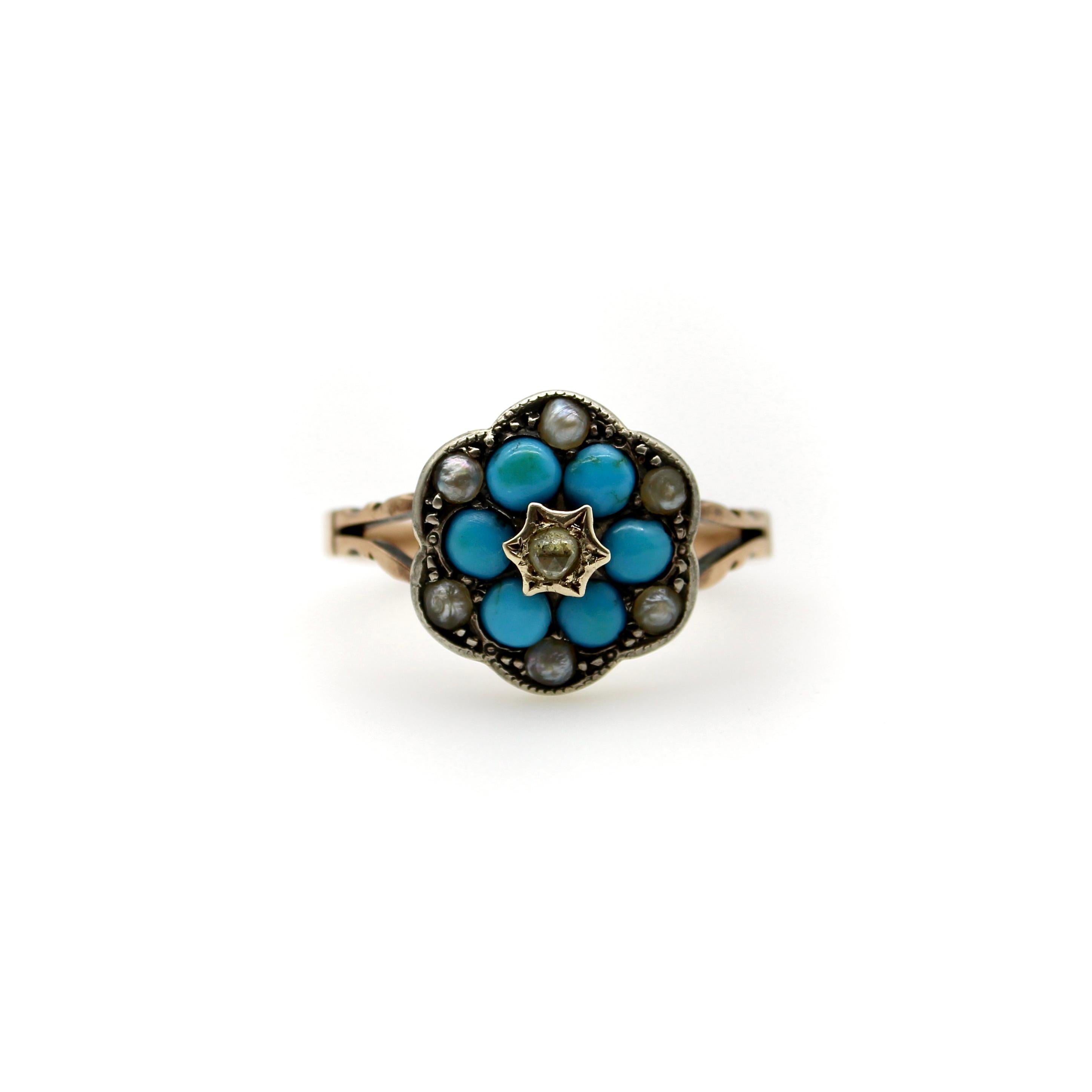 This 12k gold early Victorian ring features a flower motif of vibrant turquoise. In the center is a Rose Cut diamond set into a hand-carved star that enhances the sparkling beauty of the diamond. The turquoise flower is surrounded by bead set