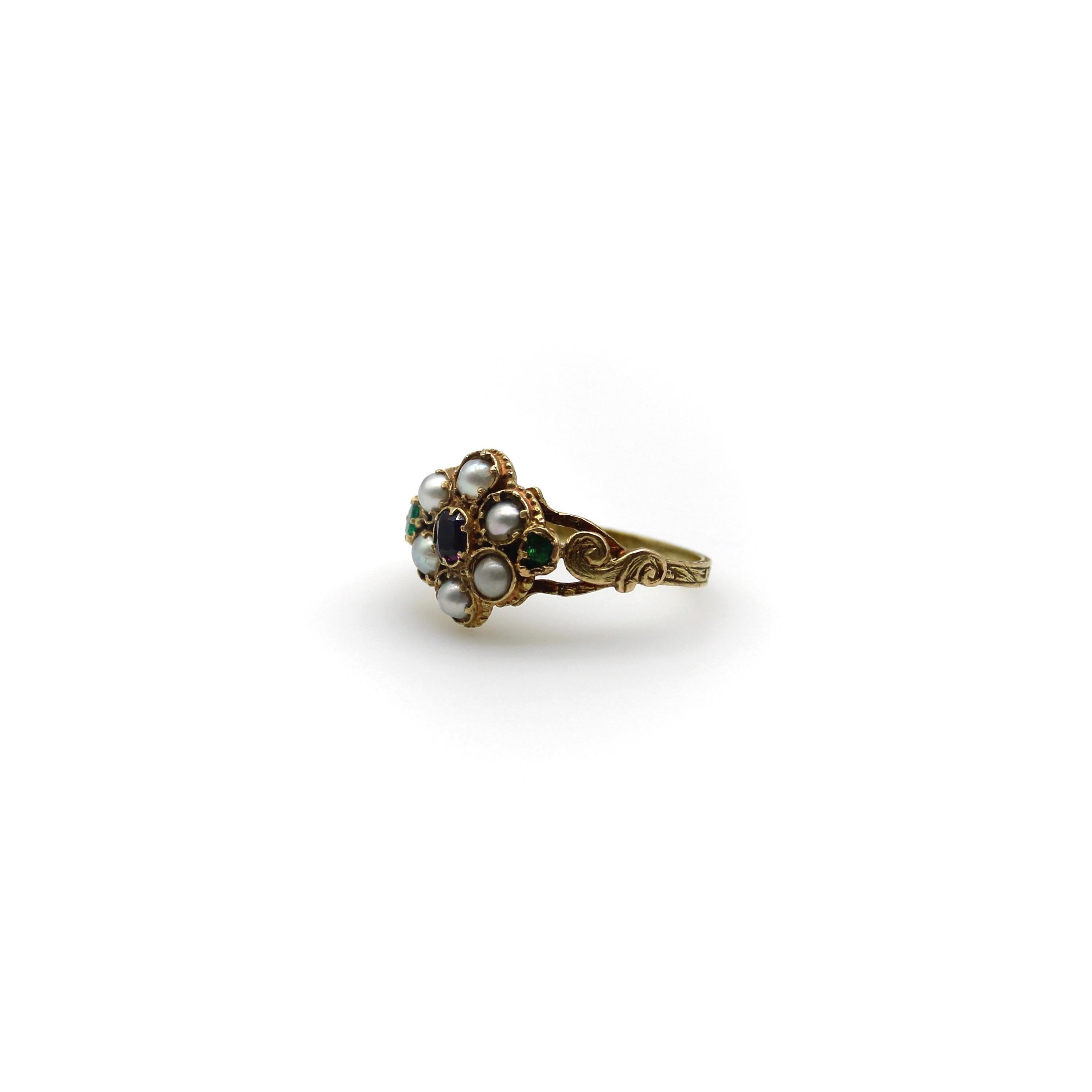 Here at Kirsten’s Corner, we have a sweet spot for these early Victorian flower rings. This 15k gold ring is reminiscent of a Forget-Me-Not flower, a popular motif in the Victorian era. The pearl flower petals in the ring represent tears and capture