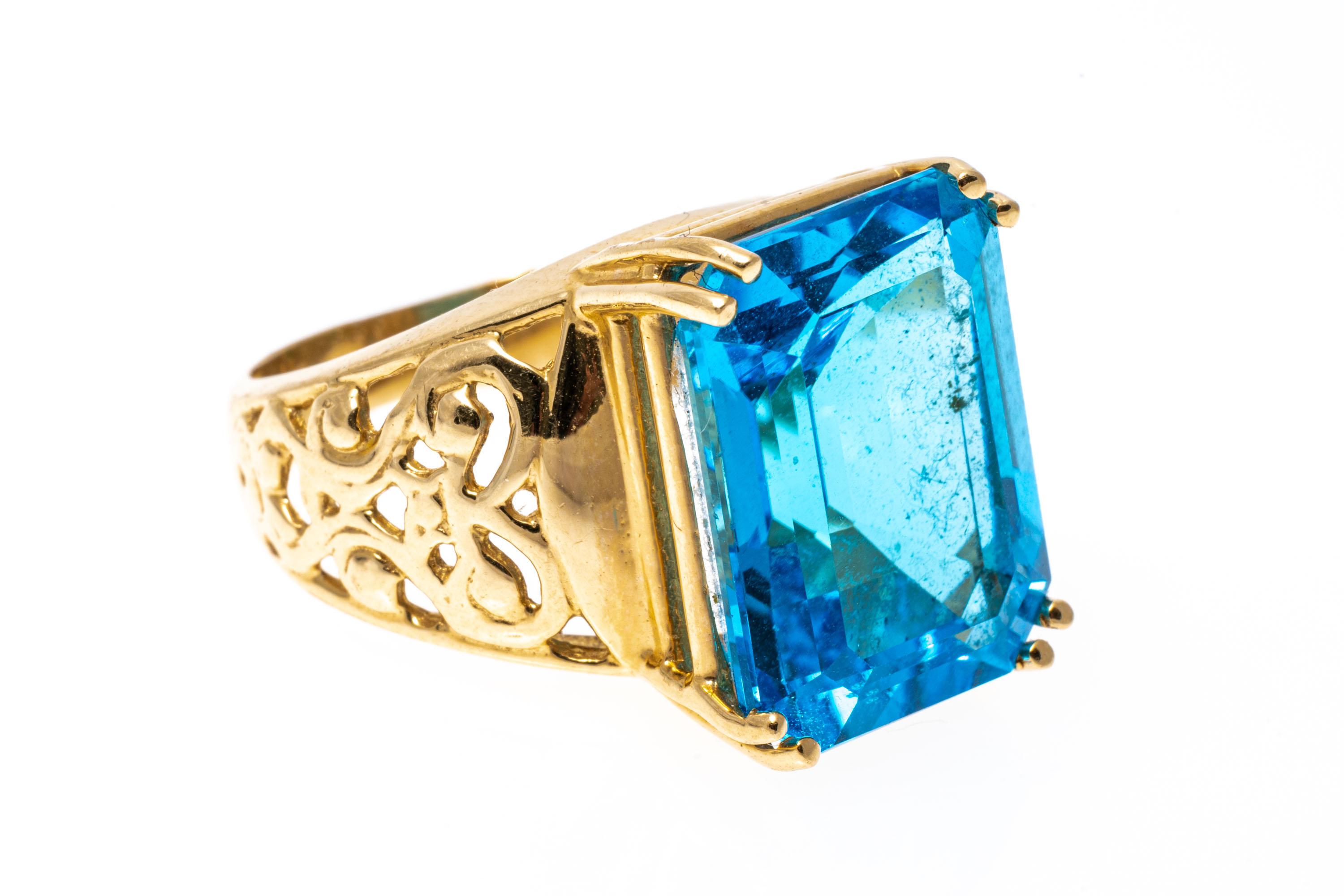 12k Gold Large Emerald Cut Deep Blue Color Blue Topaz Pierced Ring In Good Condition For Sale In Southport, CT