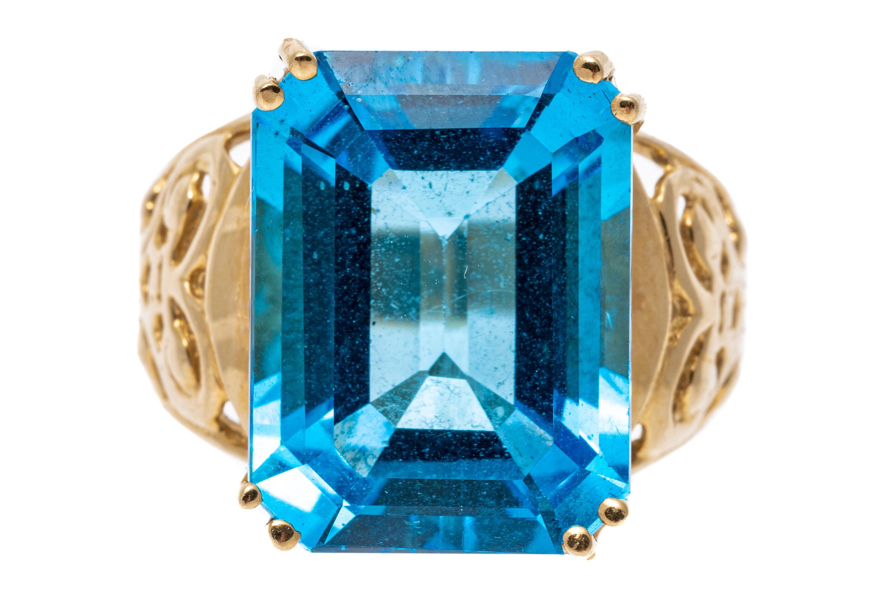 Women's 12k Gold Large Emerald Cut Deep Blue Color Blue Topaz Pierced Ring For Sale