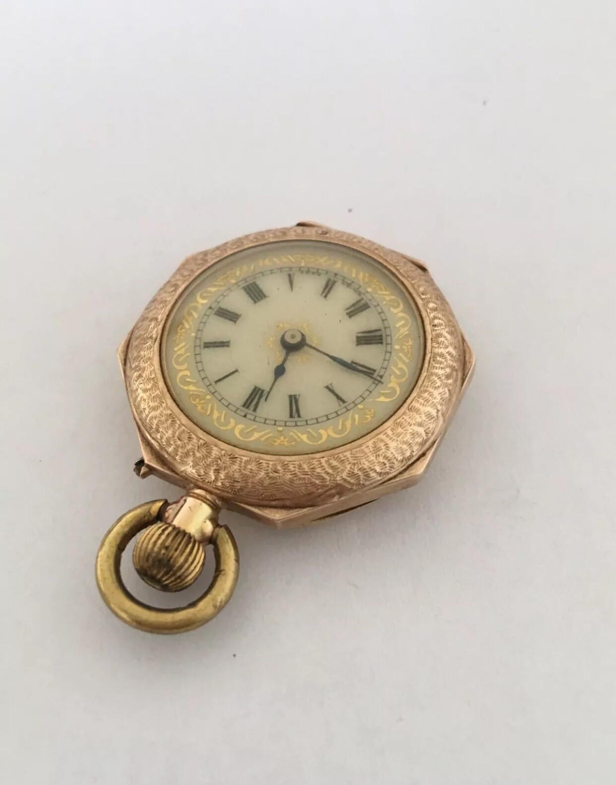 12K Gold Octagonal Shape Case Antique Pocket / Fob Watch.

This beautiful 30mm diameter antique ladies fob watch is in good working condition and it is ticking nicely. This watch weighed 20.8 grams.