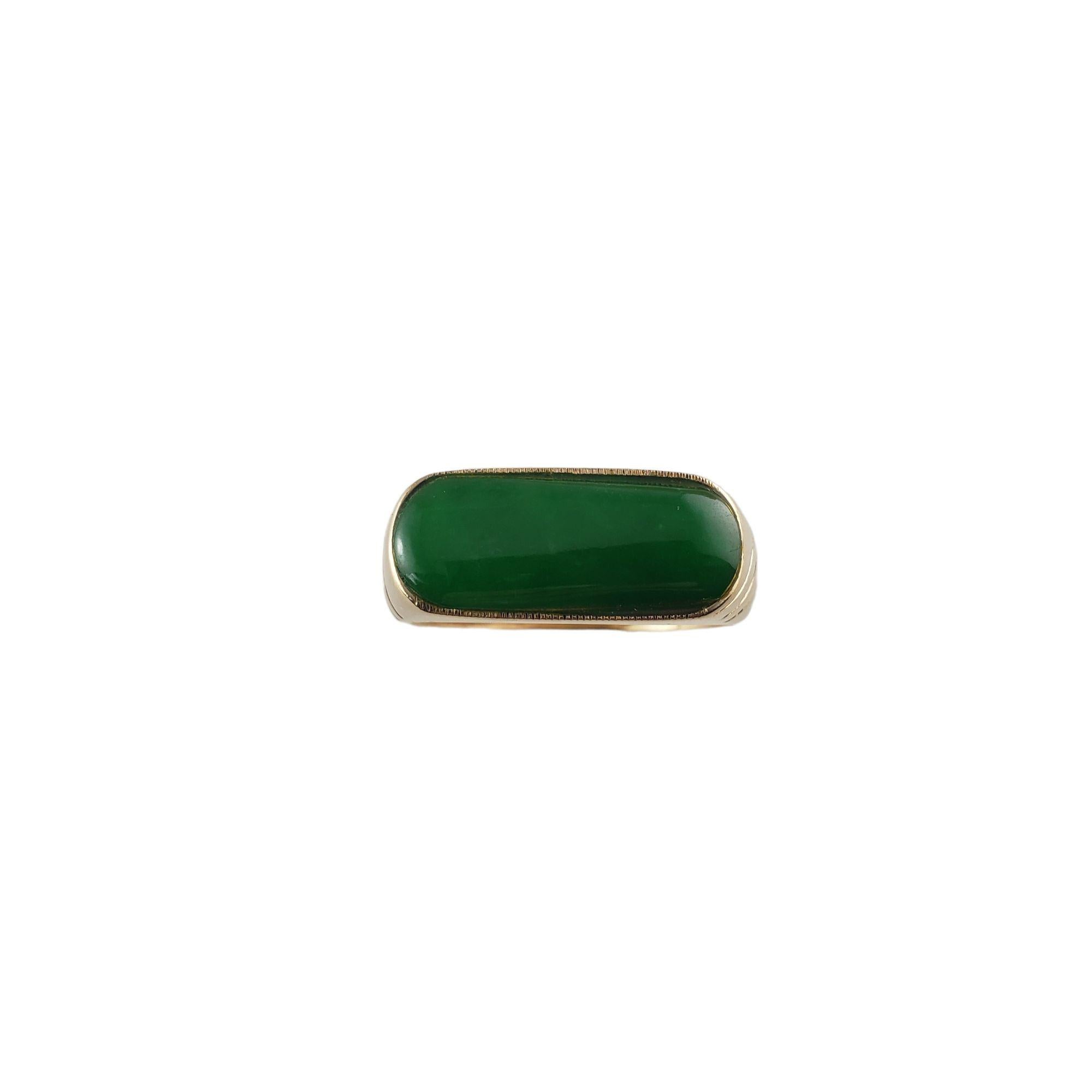 This lovely ring features one oval jadeite stone set in classic 12K yellow gold.

Jadeite measurements: 1.65 X 7.94 X 2.00 mm

Jadeite carat weight: 1.85 ct.

Size:  9.75

Shank: 4mm

Weight:  5.4 gr./  3.4 dwt.

XRF tested at 12K

Very good