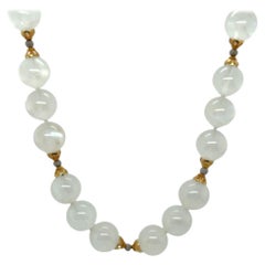 Collana di perline con pietra di luna blu Flash da 12 mm e accenti in oro bianco e giallo