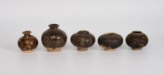 12th-13th C., A Set of Antique Khmer Brown Glazed Pottery Bottles and Lime Pots