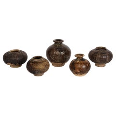 12th-13th C., A Set of Antique Khmer Brown Glazed Pottery Bottles and Lime Pots