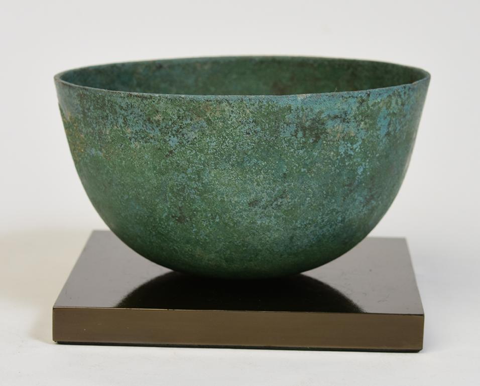 Khmer bronze bowl with nice patina.

Age: Cambodia, Angkor Vat period, 12th century
Size: Diameter 12.5 C.M. / Height 6.8 C.M.
Condition: Nice condition overall (some expected degradation due to its age).

100% satisfaction and authenticity