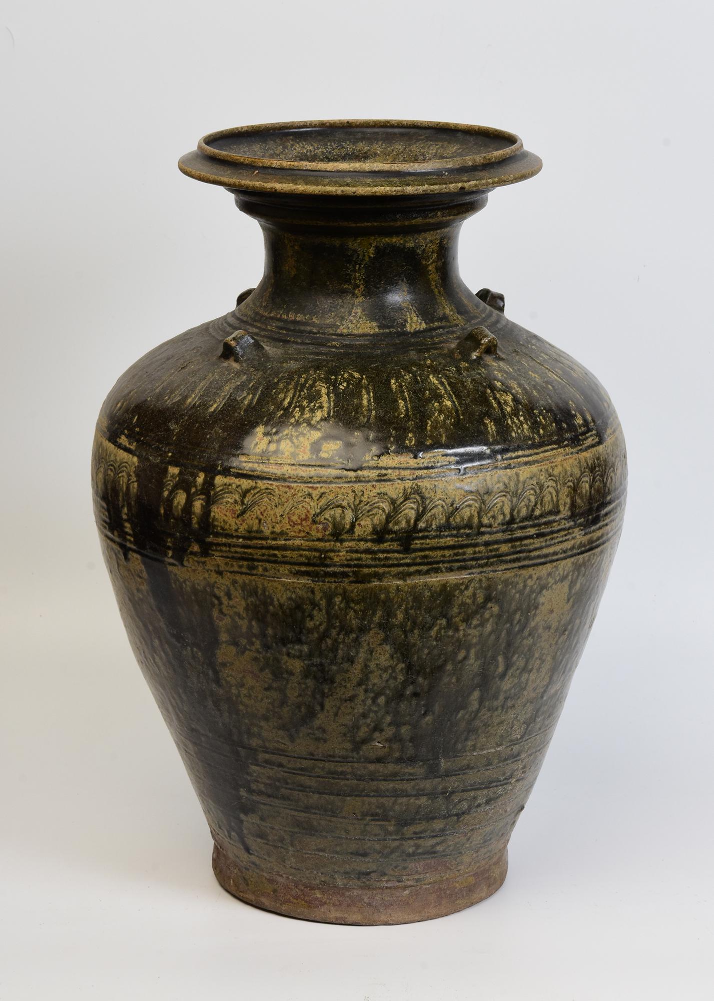 Antique Khmer dark-brown glazed pottery jar with flared mouth, decorated with carved band around the neck, encircled lines on the lower body and foot.

Age: Cambodia, Angkor Vat Period, 12th Century
Size: Height 45.5 C.M. / Width 32 C.M.
Condition: