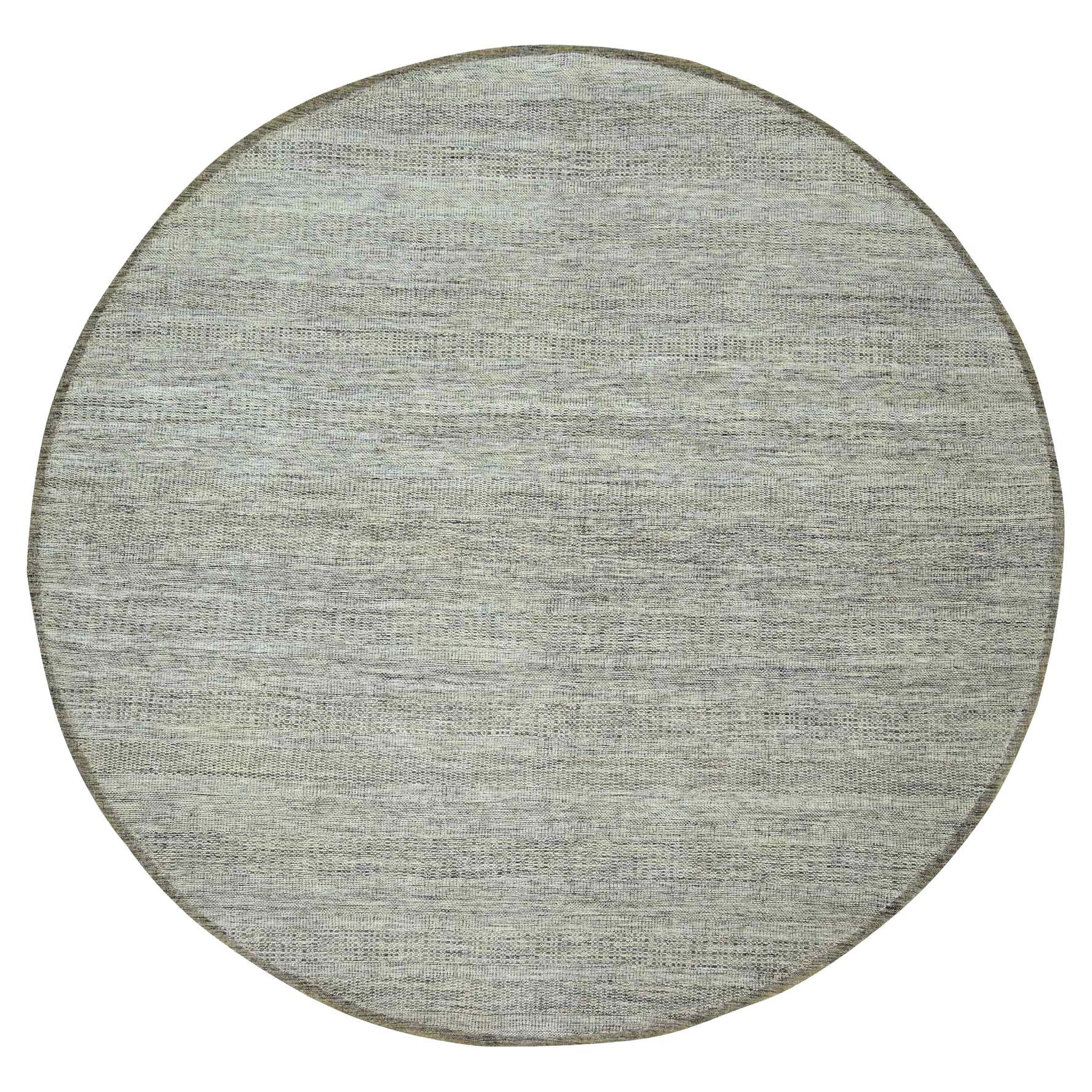 Tappeto rotondo in lana naturale 12
x12
marrone annodato a mano con disegno di erba invecchiata