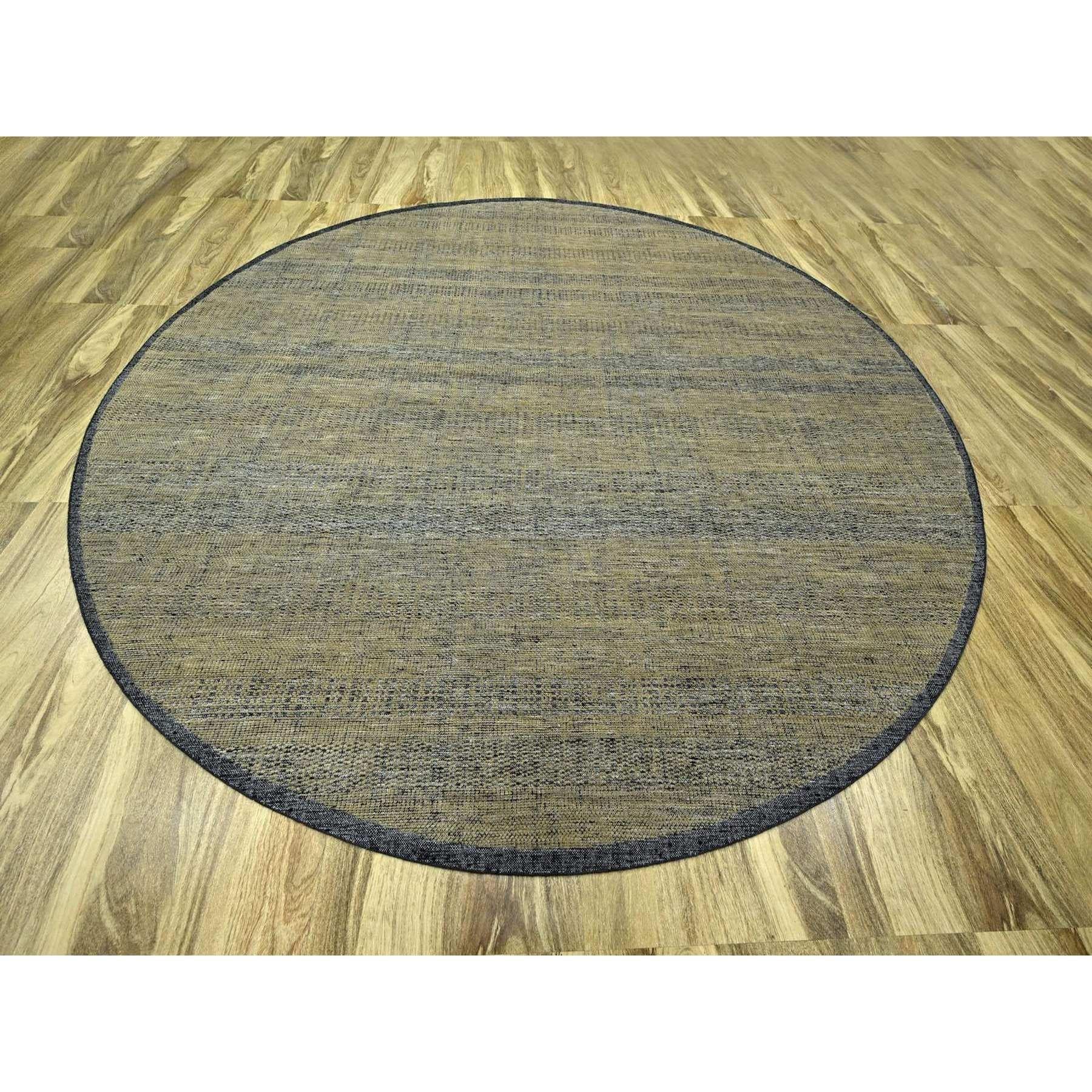 Peanut Brown and Black, Hand Knotted, Natural Wool, Oxidized and Distressed Grass Design with Exposed Warps, Round, Oriental Rug
Primary materials: Wool
Latex: No Pile 
height: 0.25 Inches
Style: Contemporary
Primary color: Brown
Secondary colors: