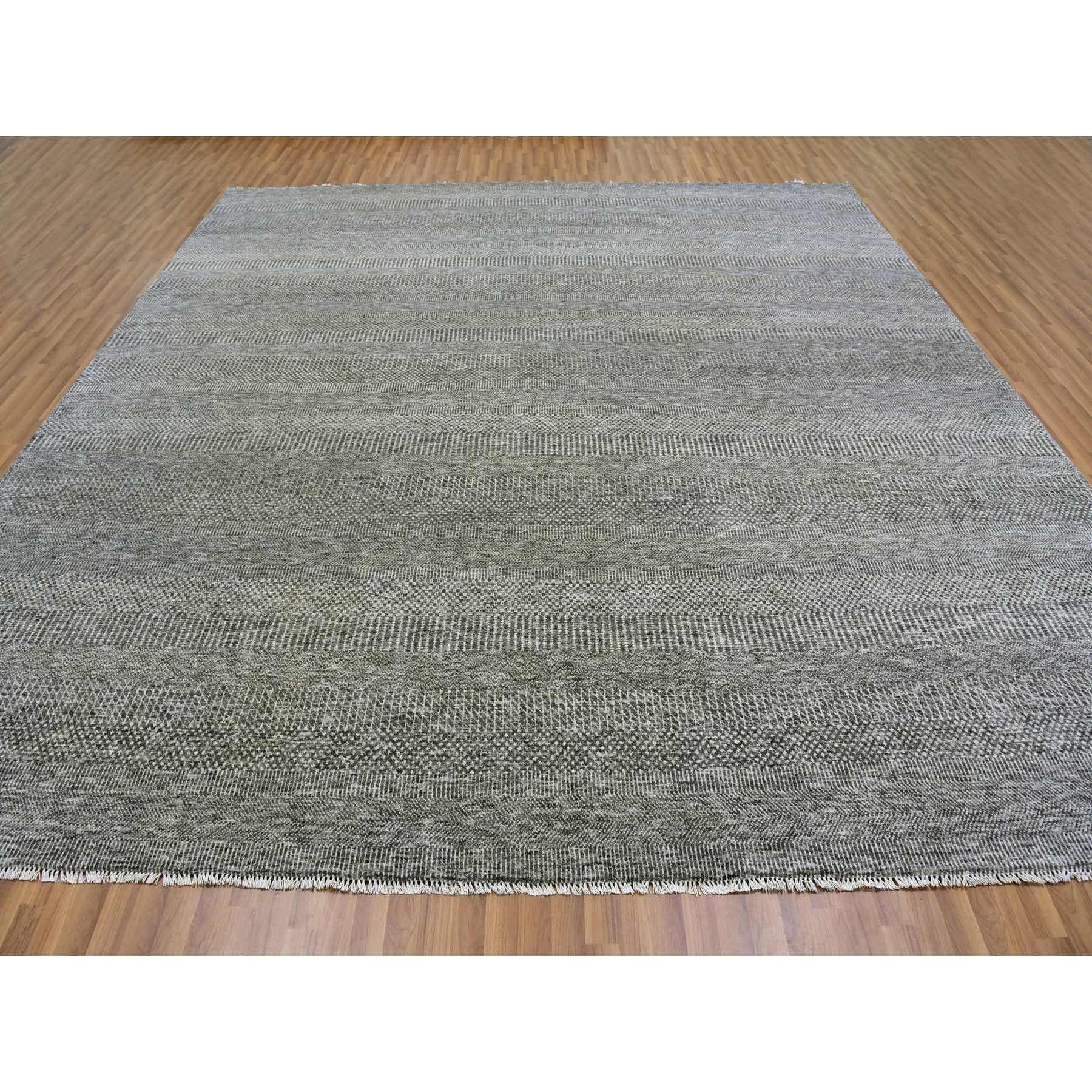 This is a truly genuine one-of-a-kind Undyed 100% Wool, Tone on Tone, Modern Grass Design, Hand Knotted, Oriental Rug. It has been Knotted for months and months in the centuries-old weaving craftsmanship techniques by artisans.
Primary materials: