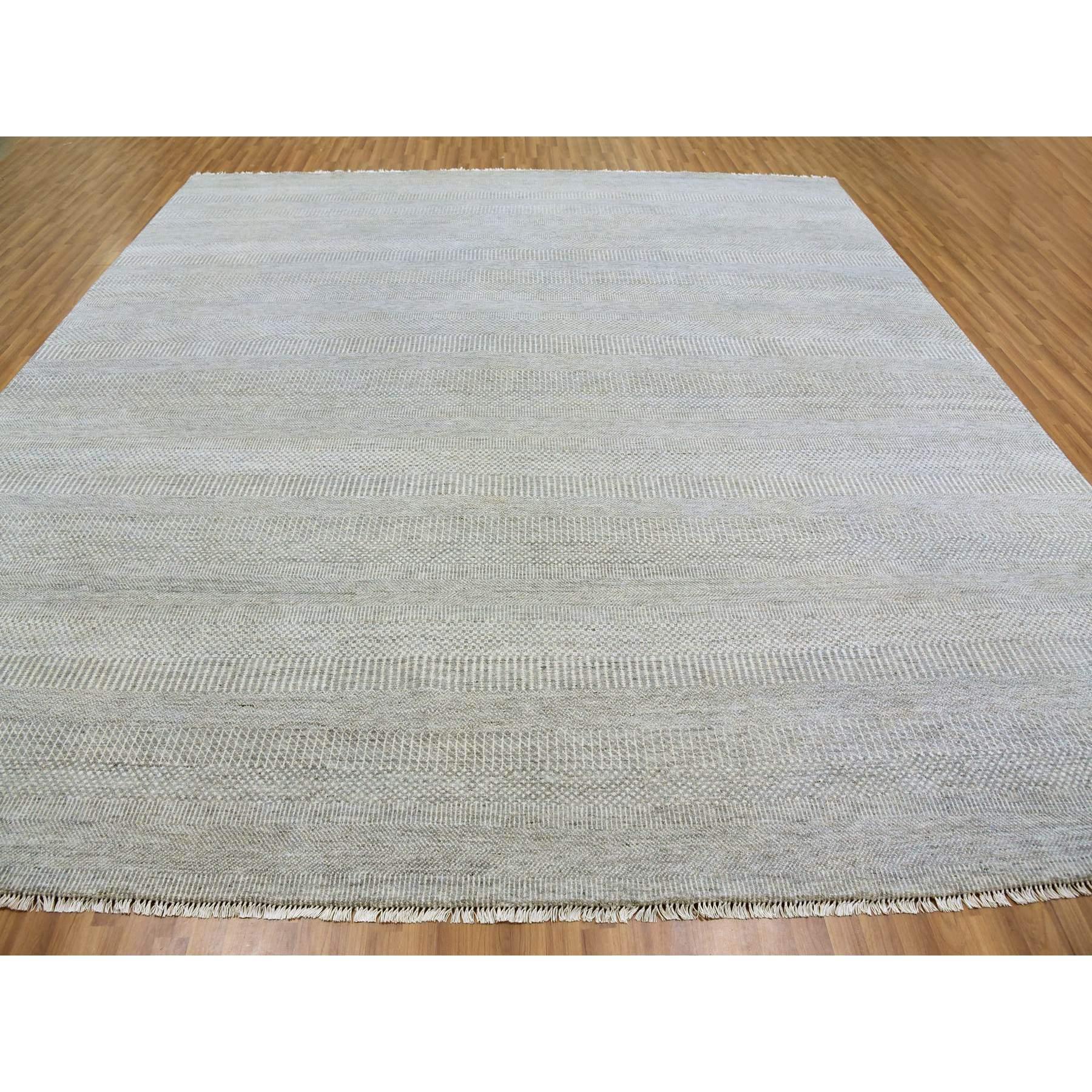 This is a truly genuine one-of-a-kind Undyed 100% Wool, Tone on Tone, Modern Grass Design, Hand Knotted, Oriental Rug. It has been Knotted for months and months in the centuries-old weaving craftsmanship techniques by artisans.
Primary materials: