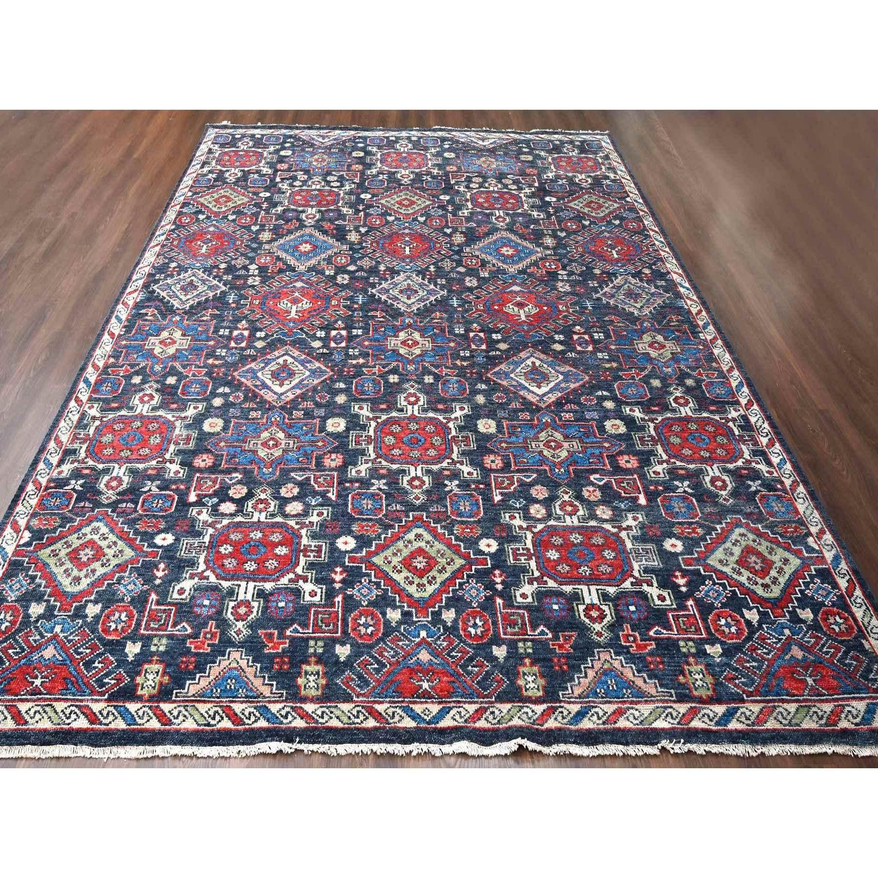 This is a truly genuine one-of-a-kind Supple Collection, Hand Knotted, Pure Wool, Oversize Oriental Rug. It has been Knotted for months and months in the centuries-old weaving craftsmanship techniques by expert artisans.
Primary materials: