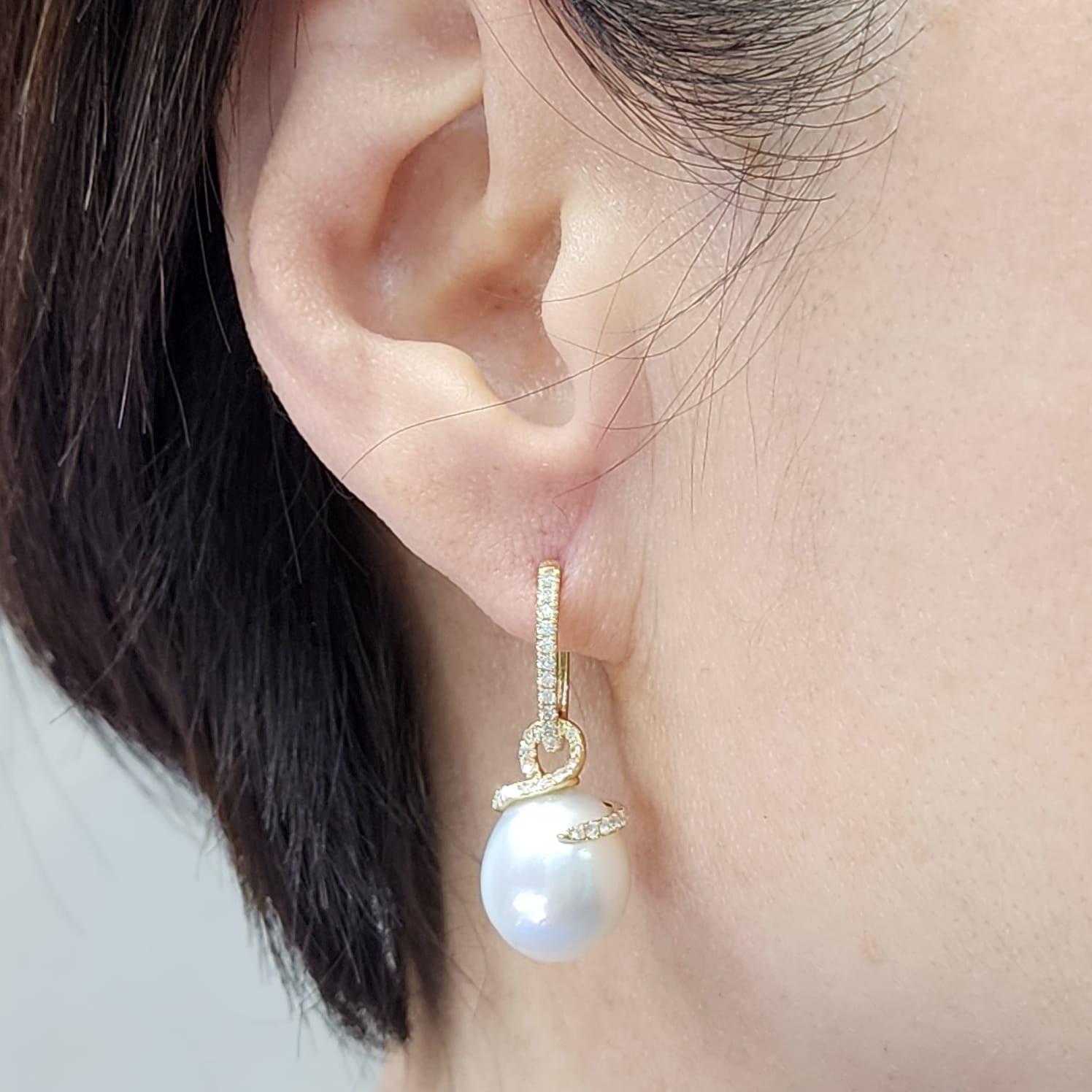 Contemporary 12x14mm Oval South Sea Pearl Diamond Dangle Earrings in 14 Karat Yellow Gold For Sale