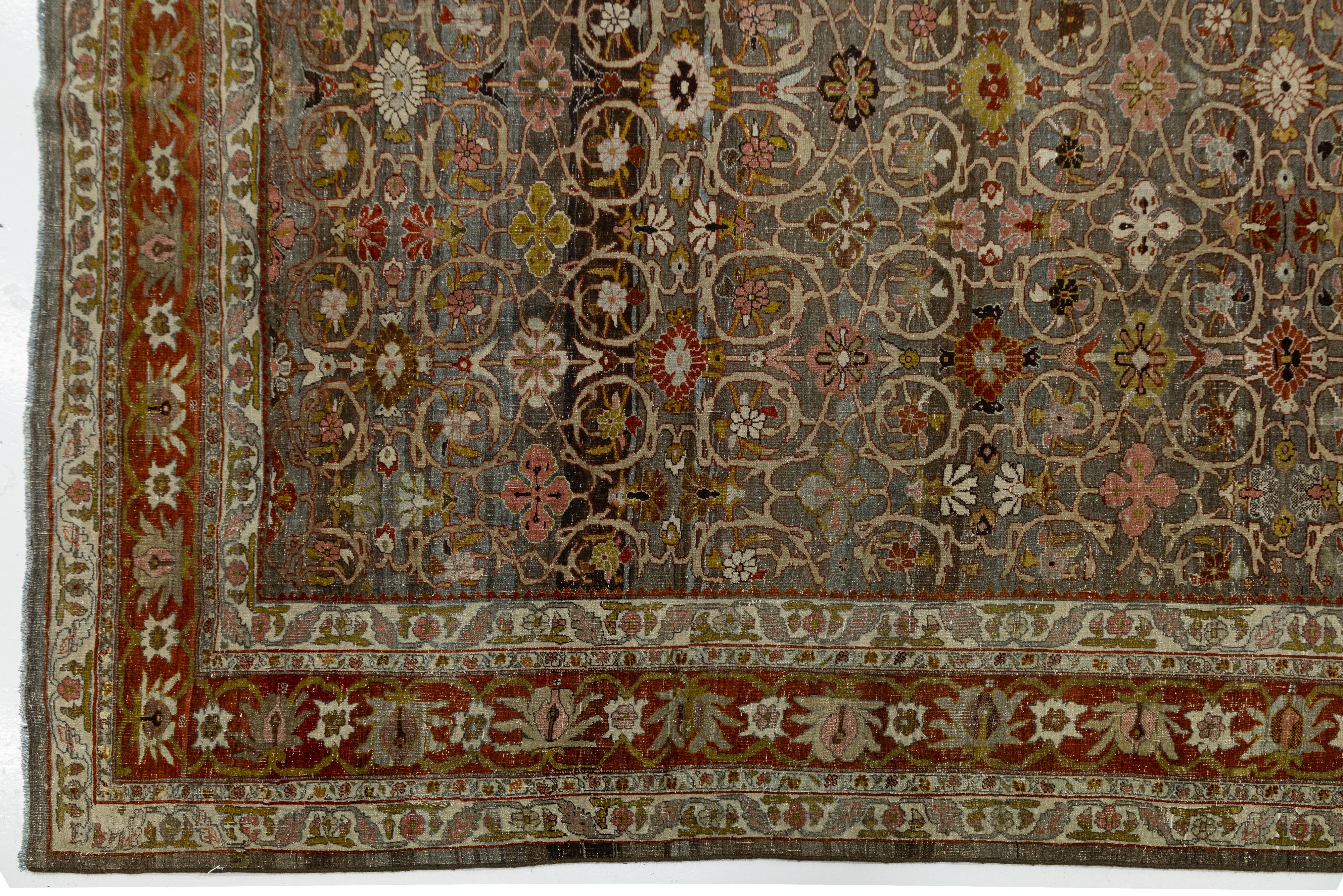 12x15 Antiker Bidjar Persischer Wollteppich Handgefertigt in erdigen Rottönen mit floralen Motiven (Wolle) im Angebot