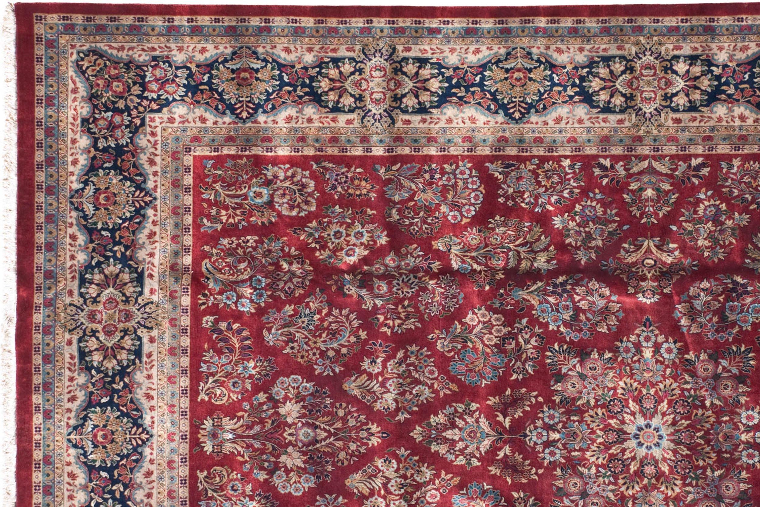 Fine example in both wool and weave bearing allover covered floral sprays and bouquets bearing detailed buds and blossoms wrapped by a shadow cartouche main border defined by design density and general contour. High luster wool in great quality adds