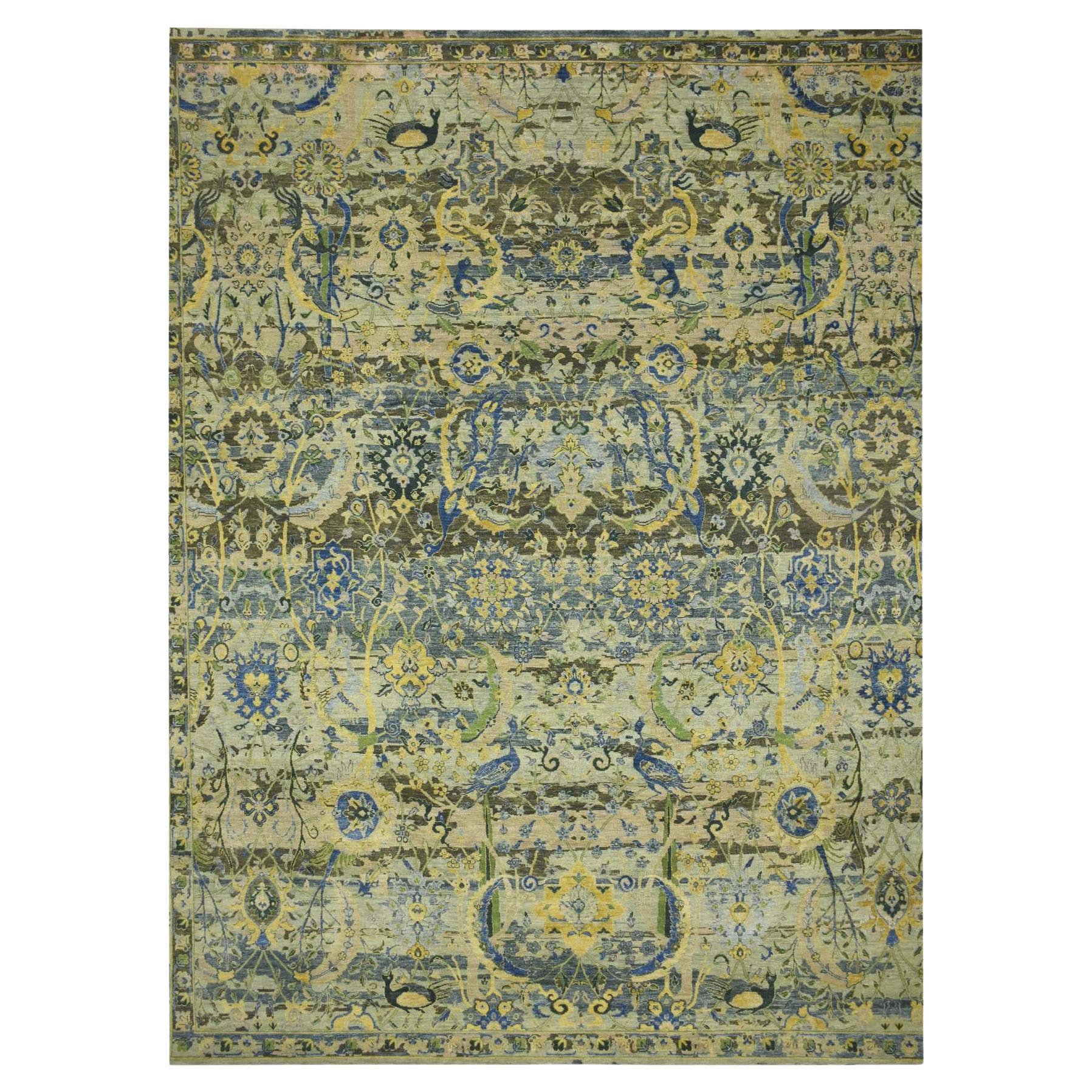 Tappeto XL verde di ispirazione persiana con disegno di uccelli annodato a mano in pura lana 12
x15
1"