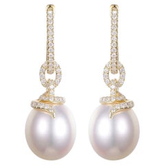 12x15mm Oval South Sea Pearl Diamond Dangle Earrings in 14 Karat Yellow Gold