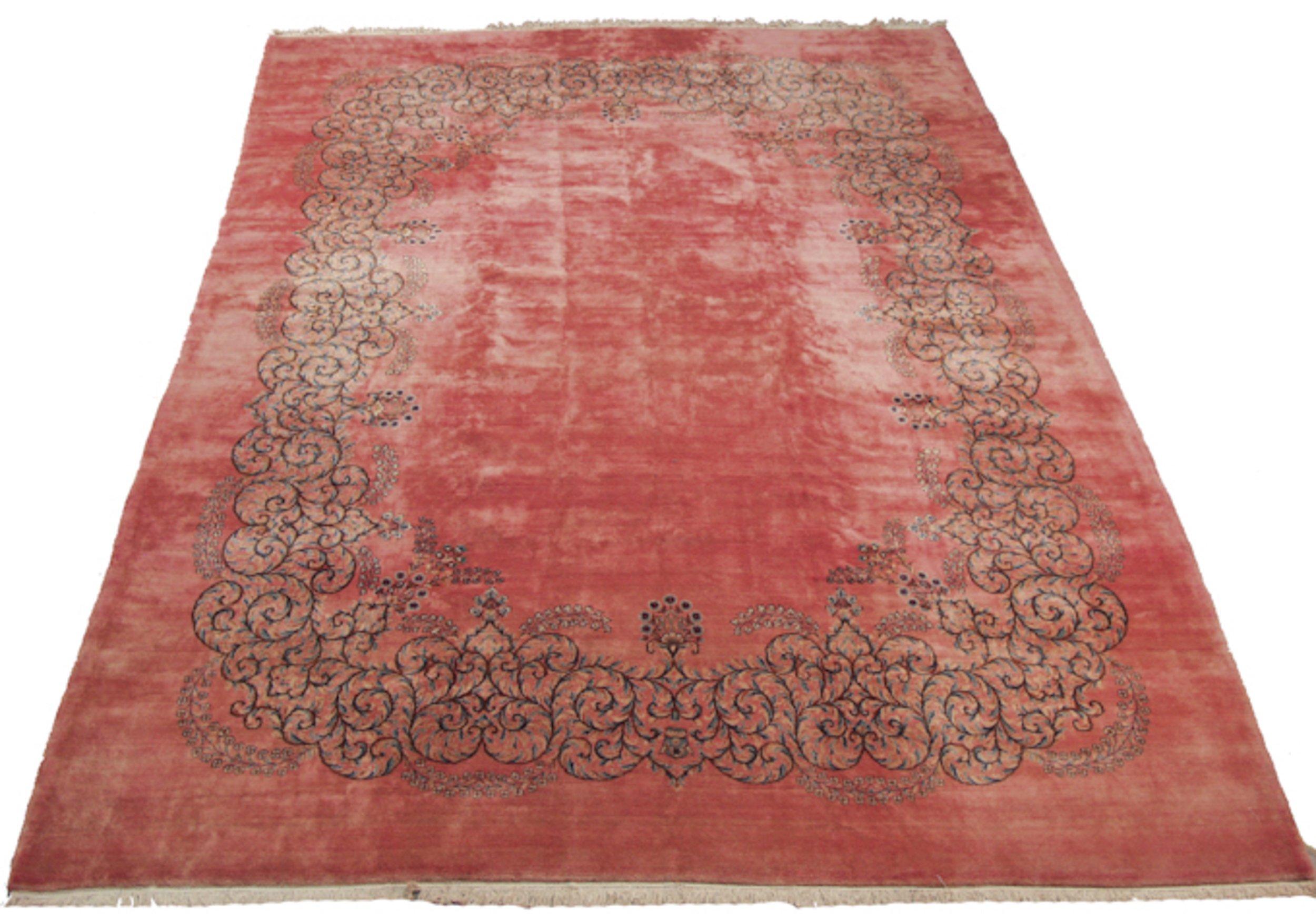 Highly unusual open field with floating oversized scrolling vine main border with European Rococo motif and detailed elongated blossomed stems. Colors and shades include: Dusty rose, pink, sky blue, navy blue, cochineal red, and more. Condition
