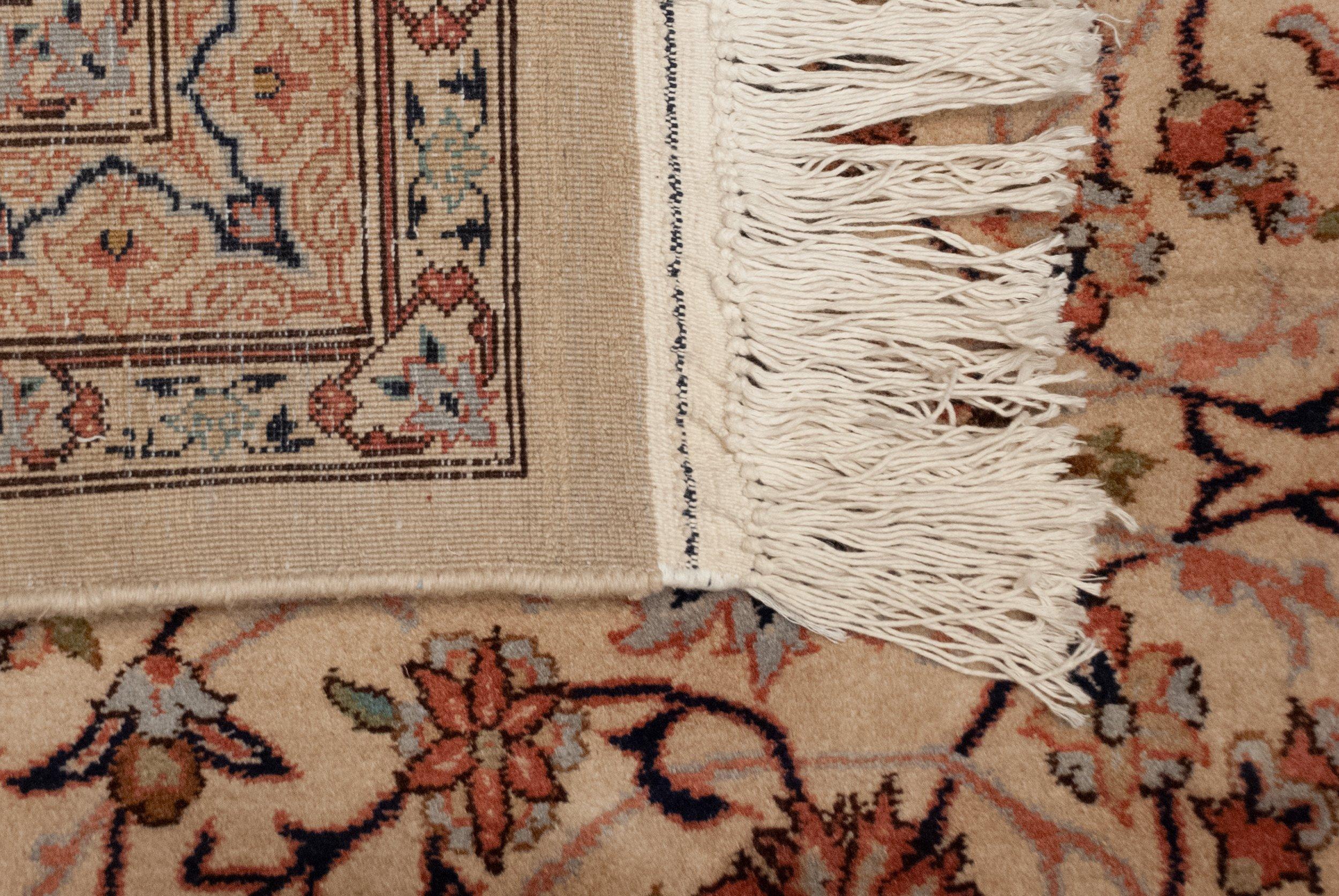 :: Intricate covered field in a detailed floral vinery bearing buds, blossoms and cross sections all interconnected throughout. Fine, soft long-stapled wool with healthy luster and sheen. Colors and shades include: Antique ivory, navy blue,