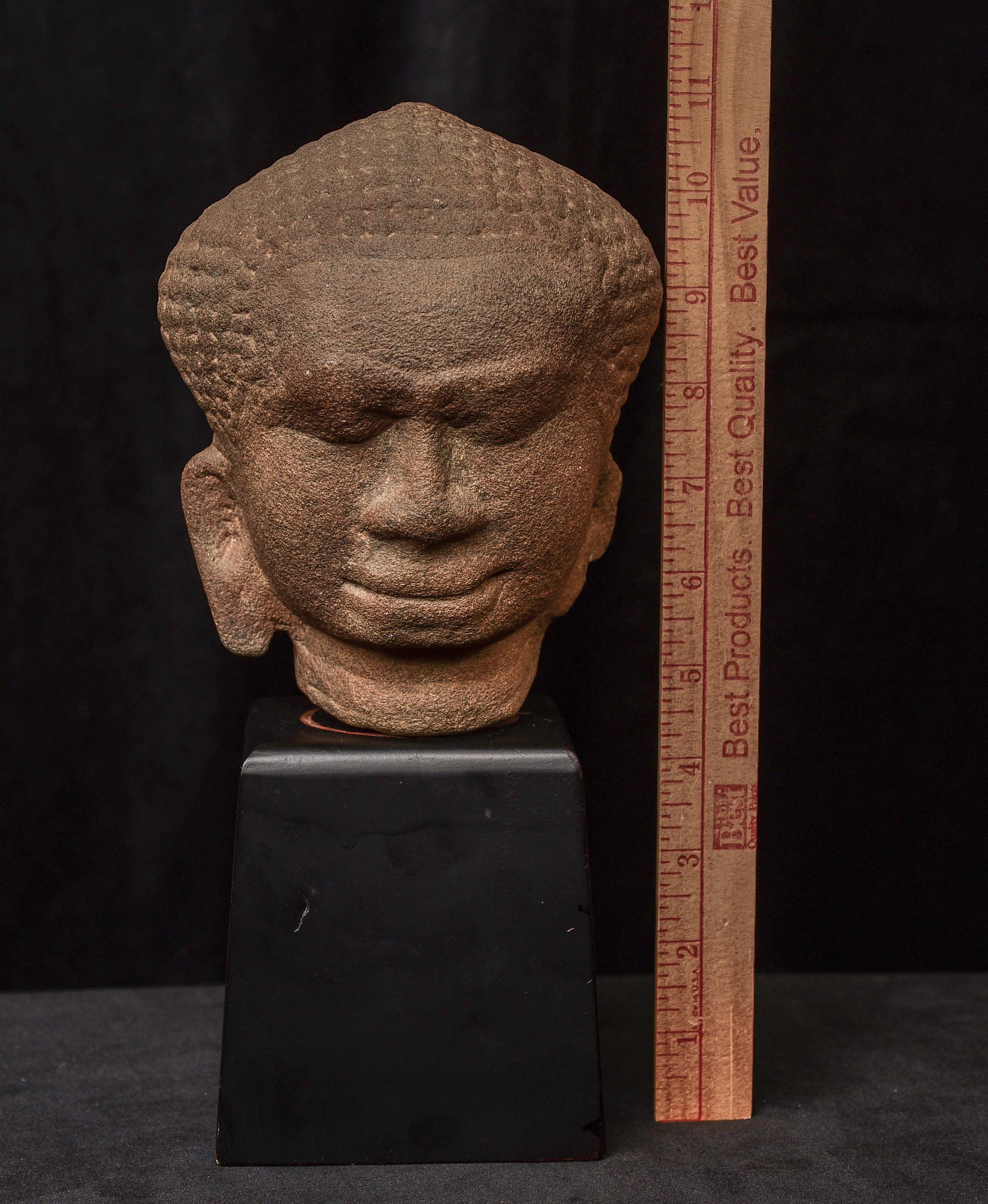 13/14thC Thai Stone Buddha Head- Sweet! For many centuries, up until the 13th or 14th centuries, in Northern Thailand, south of Chiang Mai, (under Cambodian domination during the Khmer Empire , existed the Haripunchai Kingdom. It blends Khmer and