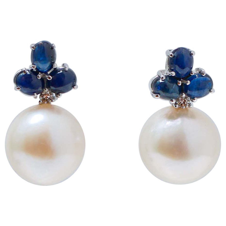 13, 5 Mm Pearls, Sapphires, Diamonds, 14 Karat White Gold Earrings.
