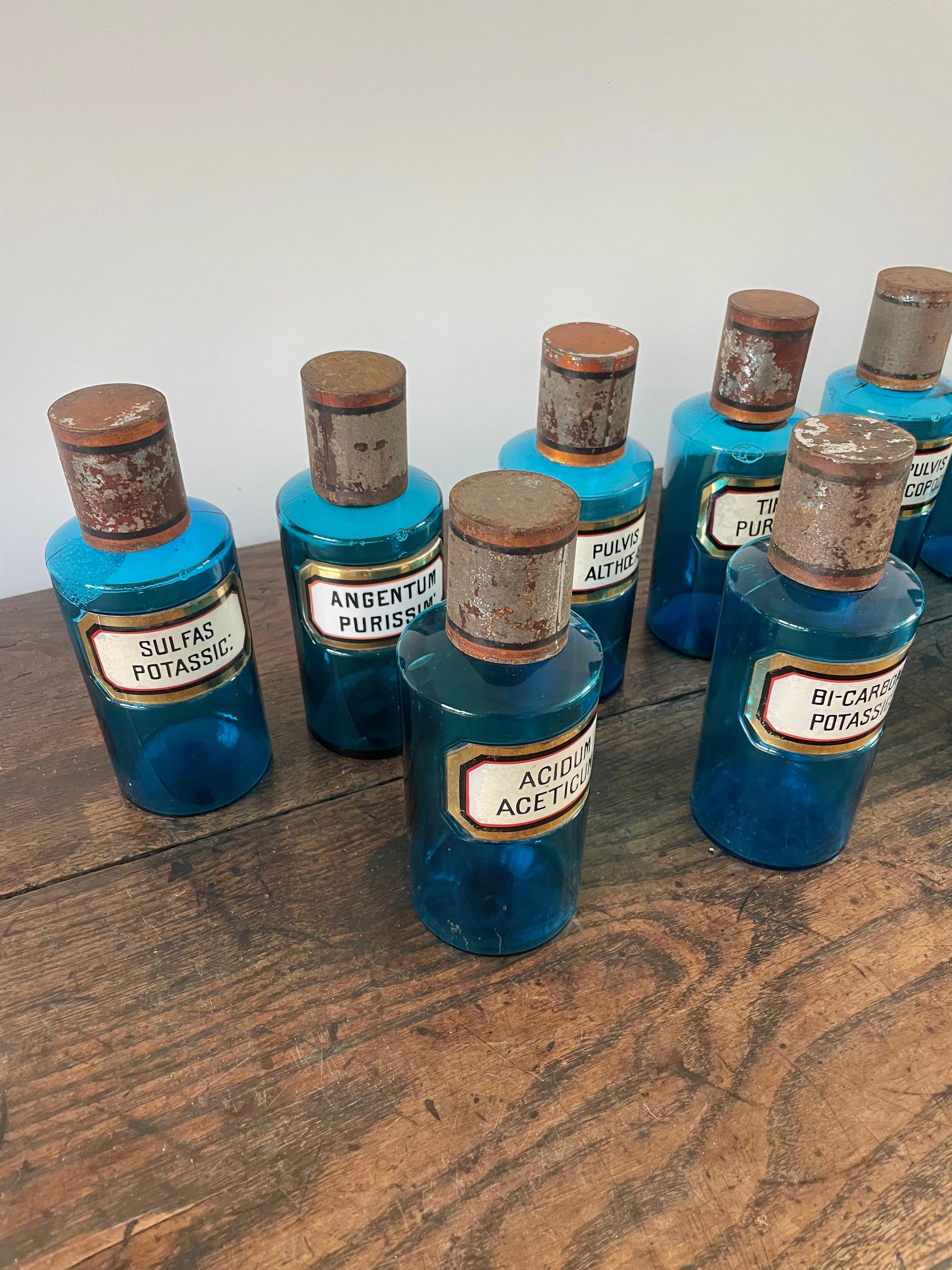 20th Century 13 antique blue glass apothecary bottles For Sale