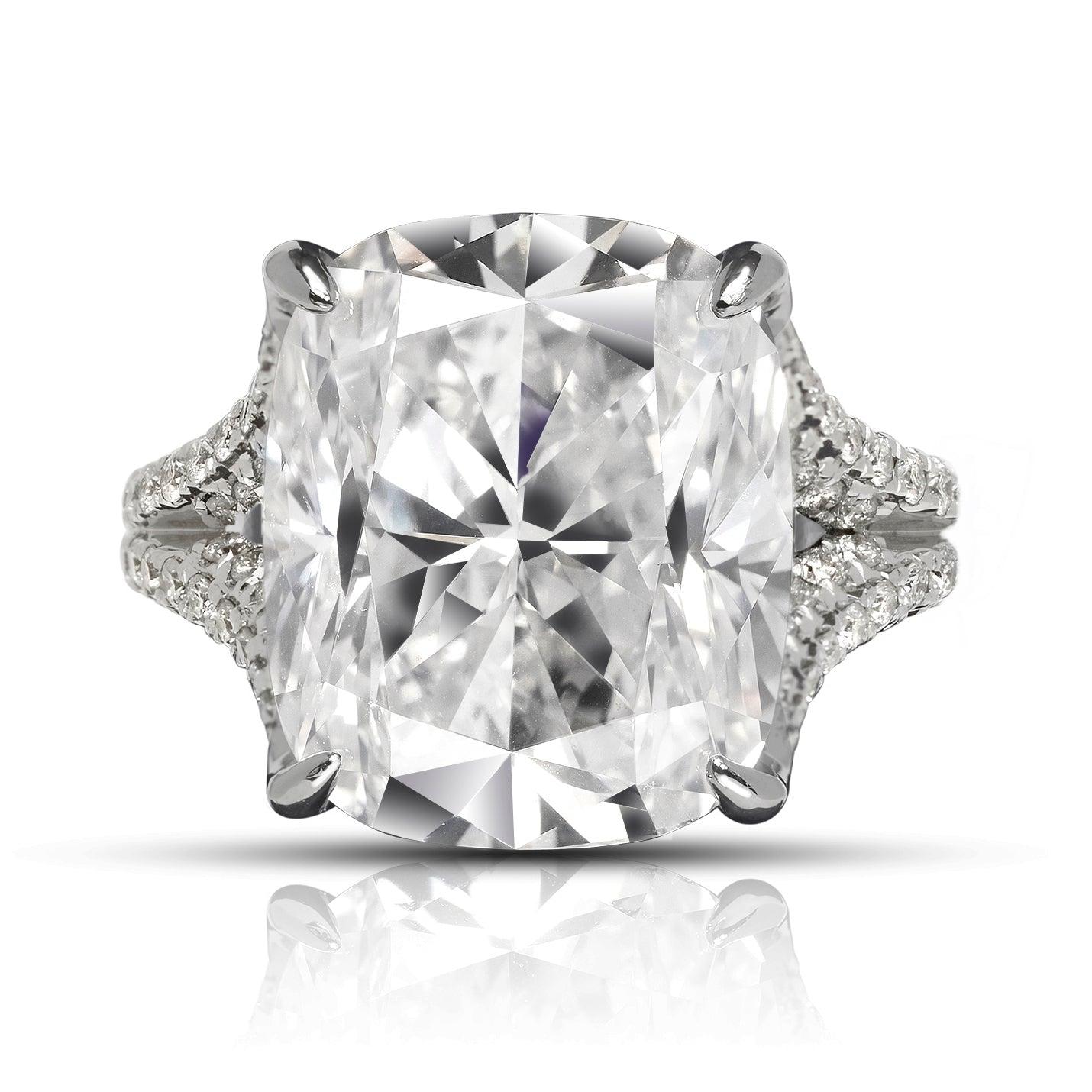 VICTORIA -13 CT CUSHION DIAMOND ENGAGEMENT RING BY MIKE NEKTA

GIA CERTIFIED

Center Diamond:
Carat Weight: 11.2 Carat
Color: E*
Clarity: VVS1
Style: CUSHION BRILLIANT
Measurements: 14.4 x 12.0 x 8.2 mm
* This diamond has been treated by one or more