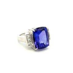 13 Carat Cushion Tanzanite and Princess Diamond Gold Solitaire Statement Ring