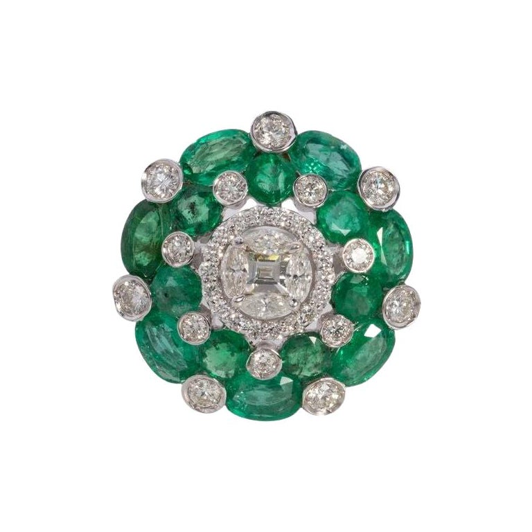 With 7 carats of natural deep green emeralds, seated in a bed of diamonds, the Ziya is made in 14K gold. Pair these with our Ziya earrings.
Gemstone Details
Natural Emeralds 
Type 	Natural  Emeralds 
Color	Deep Green 
Clarity 	Fine
Weight 	7