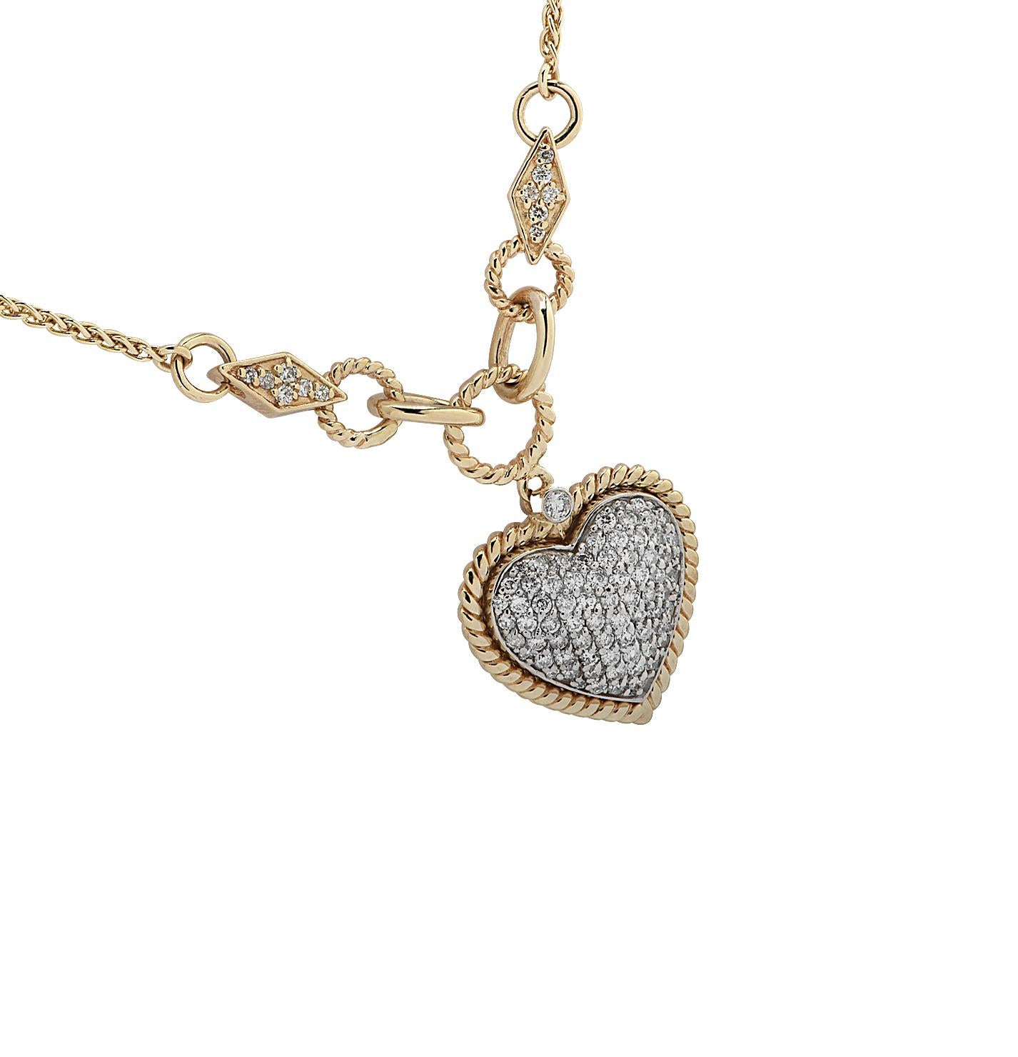 Enchanting necklace crafted in yellow gold featuring round brilliant cut diamonds weighing approximately 1.3 carats total G color, SI clarity. A delightful diamond encrusted heart nestling in a twisted yellow gold frame with a diamond detail,