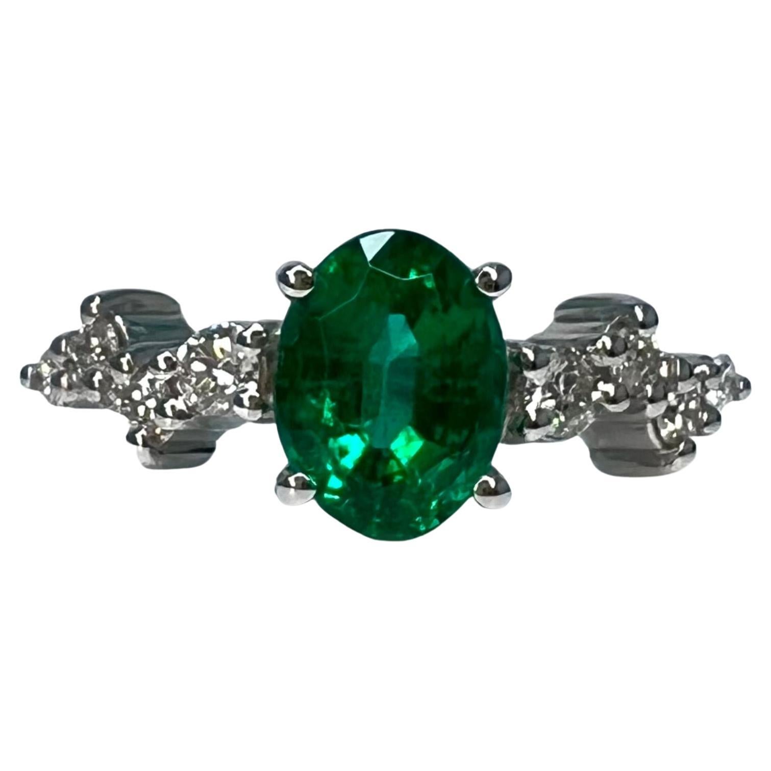 1.3 Carat Emerald Oval Cluster Ring 18k White Gold For Sale