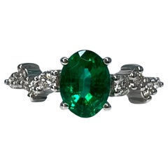 1.3 Carat Emerald Oval Cluster Ring 18k White Gold