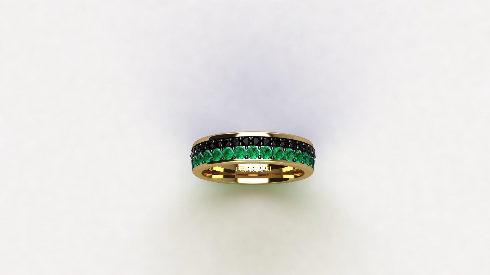 Green emerald and Black diamonds eternity ring,  an approximate emeralds carat weight of 0.72 carat and approximate black diamonds carat weight of 0.50 carats, hand made in New York City with the best Italian craftsmanship, conceived in 18k yellow