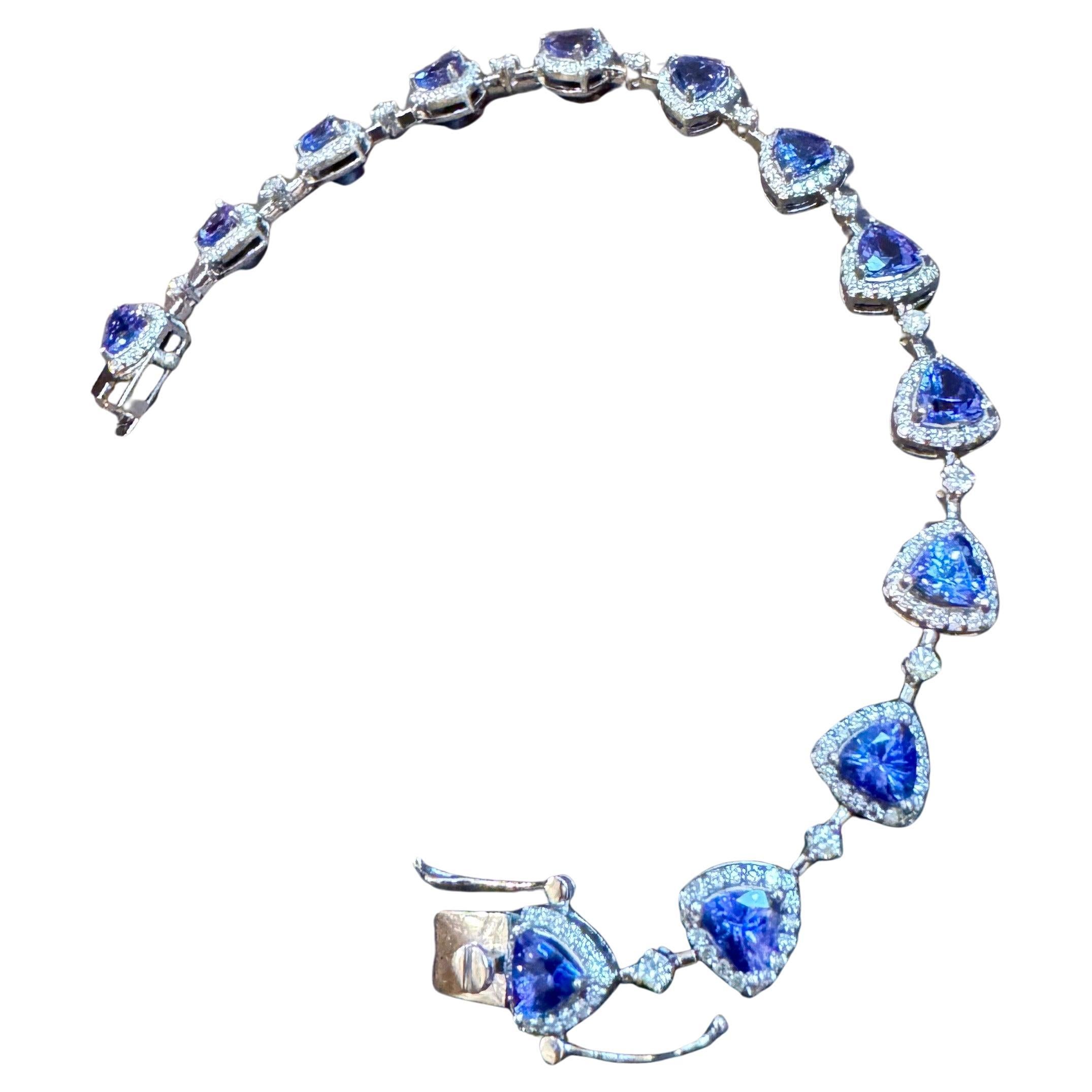  This exceptionally affordable Tennis  bracelet has  Multiple stones of  Tanzanite in Trillion shape . 
 Total weight of Tanzanite  is approximately 13 carat. Total  weigh of diamond is approximately 2.5 ct
The bracelet is expertly crafted with 16